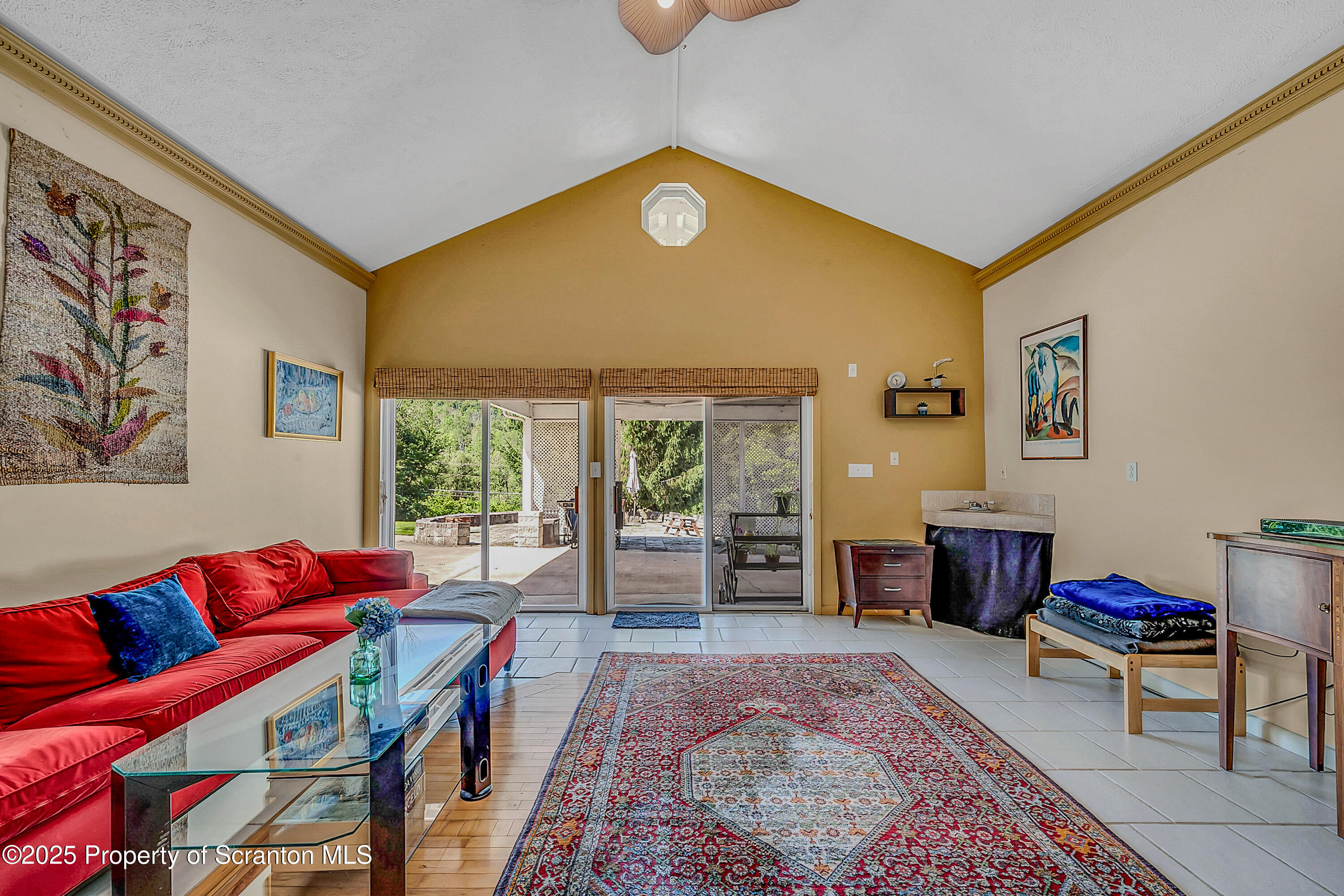 831 Montdale Road Scott Township, PA 18447 - Photo 27 of 46 a living room with furniture and a window