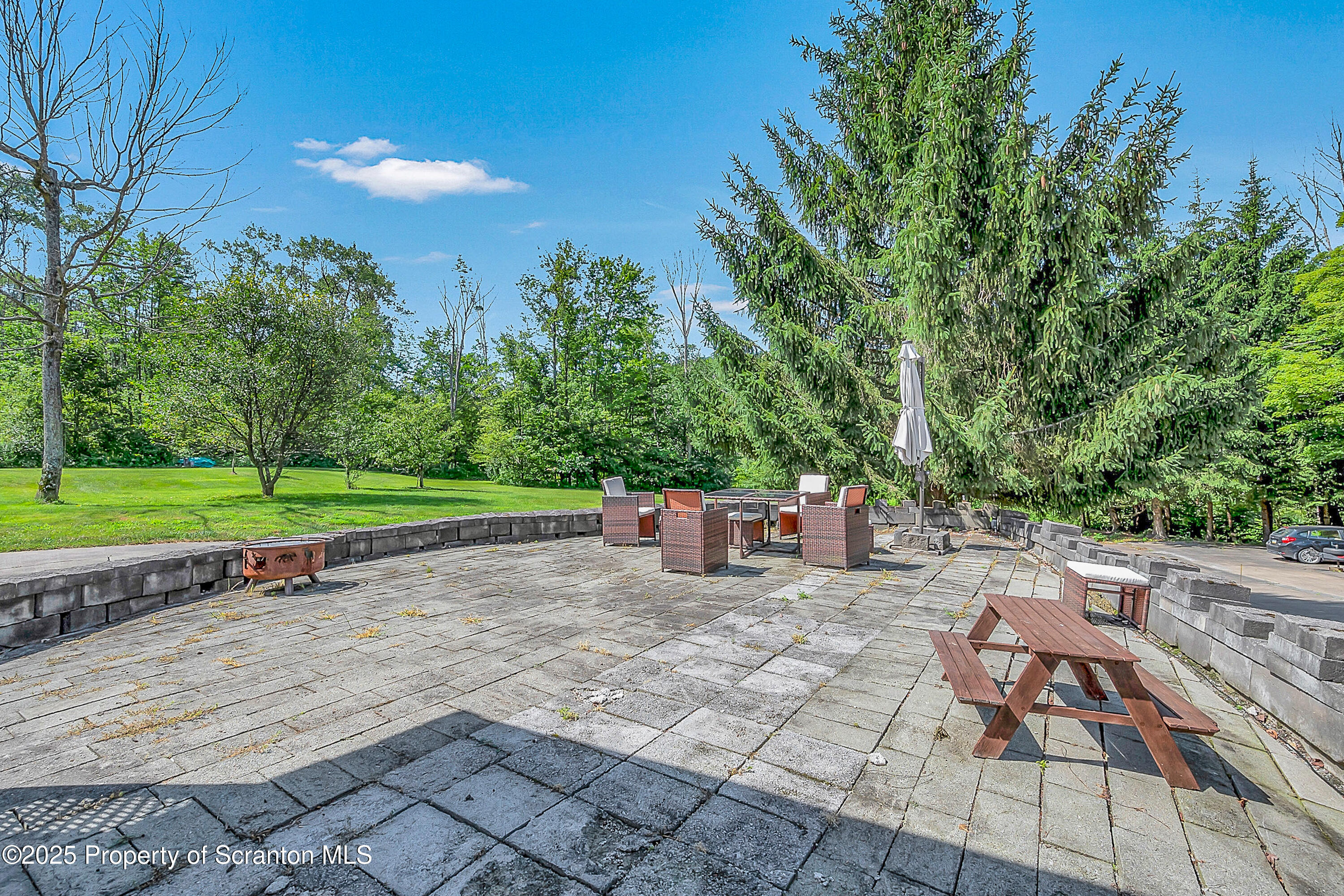 831 Montdale Road Scott Township, PA 18447 - Photo 6 of 46 a view of a backyard with sitting area
