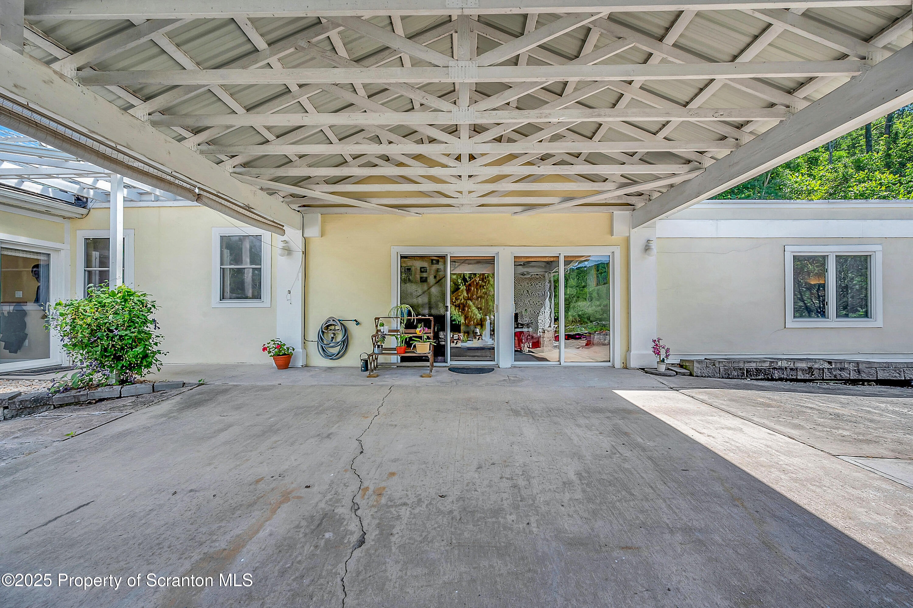 831 Montdale Road Scott Township, PA 18447 - Photo 10 of 46 a view of a house with a patio