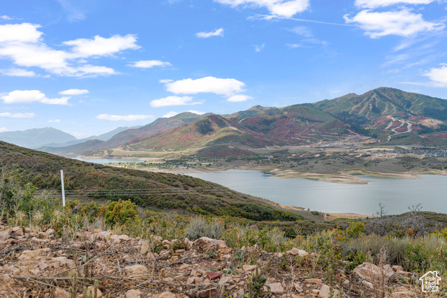 10677 North Reflection Ridge, Unit 1 Hideout, UT 84036 - Photo 6 of 41 View of mountain background featuring a large body of water