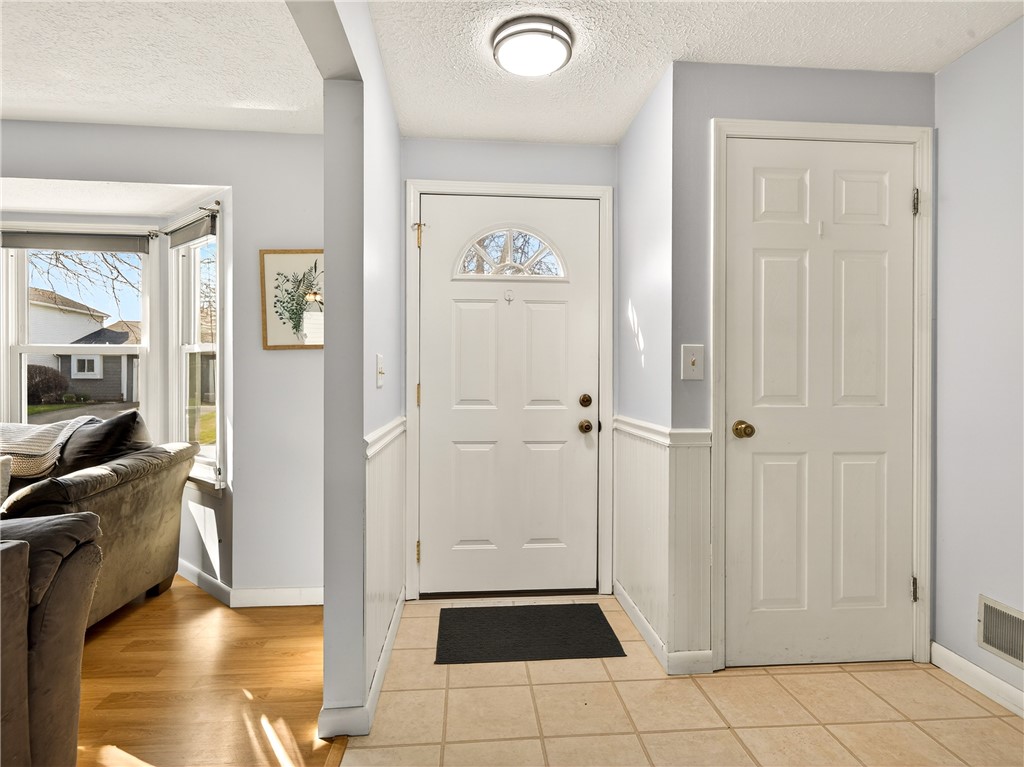 152 Fawn Lane Webster, NY 14580 - Photo 2 of 30 Front Entry with coat closet