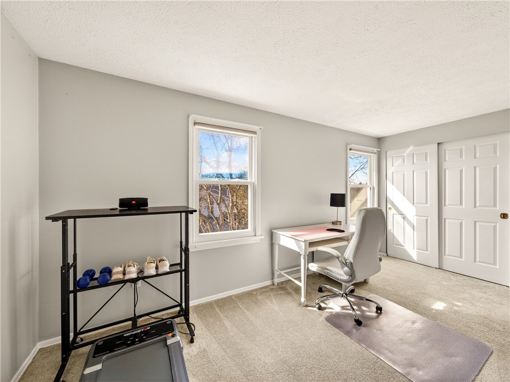 152 Fawn Lane Webster, NY 14580 - Photo 24 of 30 Front, second bedroom with good storage/closet.