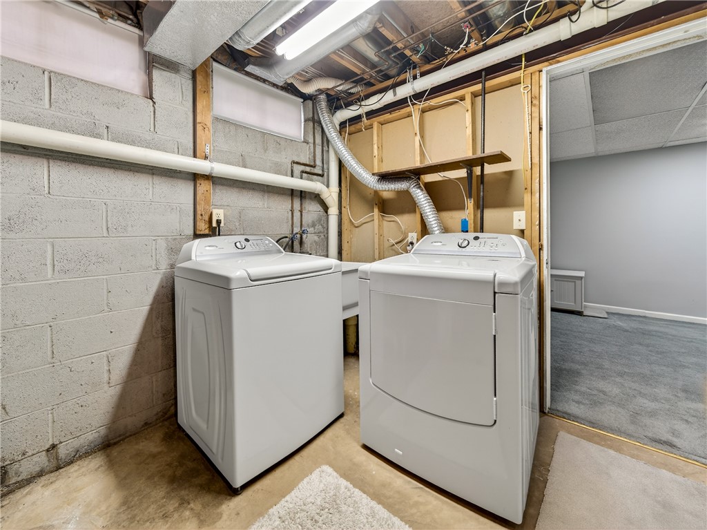 152 Fawn Lane Webster, NY 14580 - Photo 26 of 30 Lower Level laundry with sink