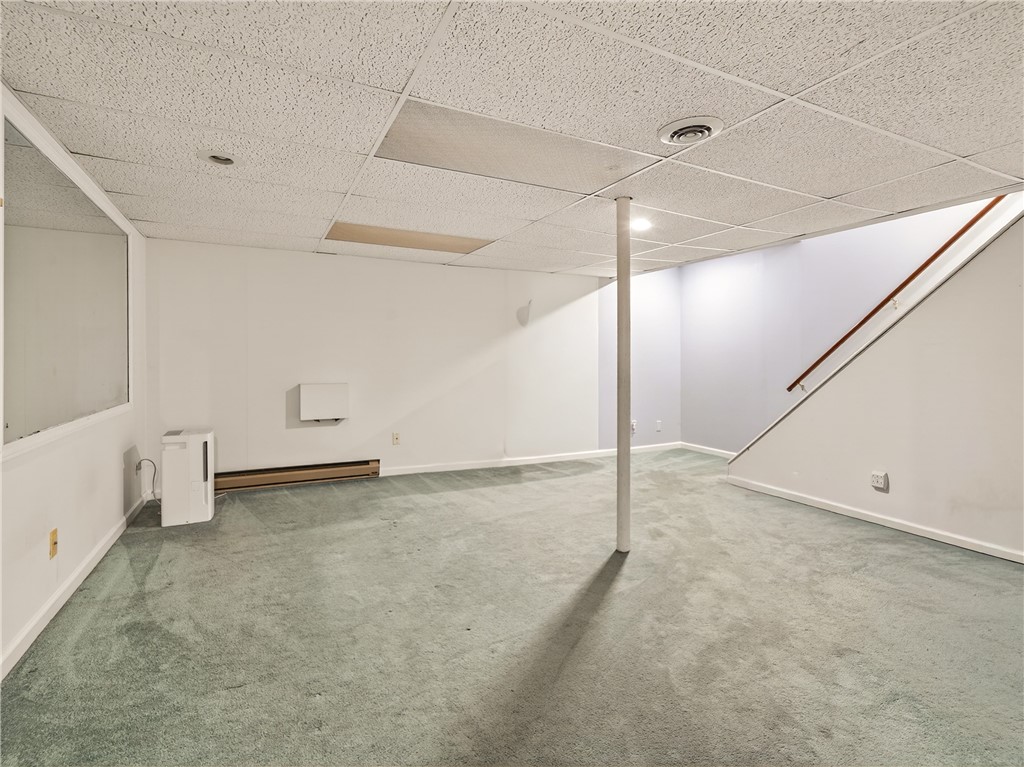 152 Fawn Lane Webster, NY 14580 - Photo 27 of 30 Large lower level with newer carpet, dehumidifier