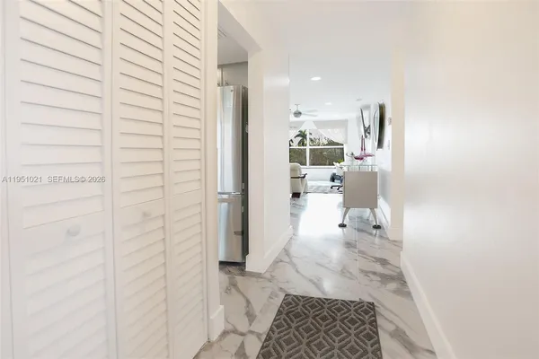 a view of a chairs and table in patio