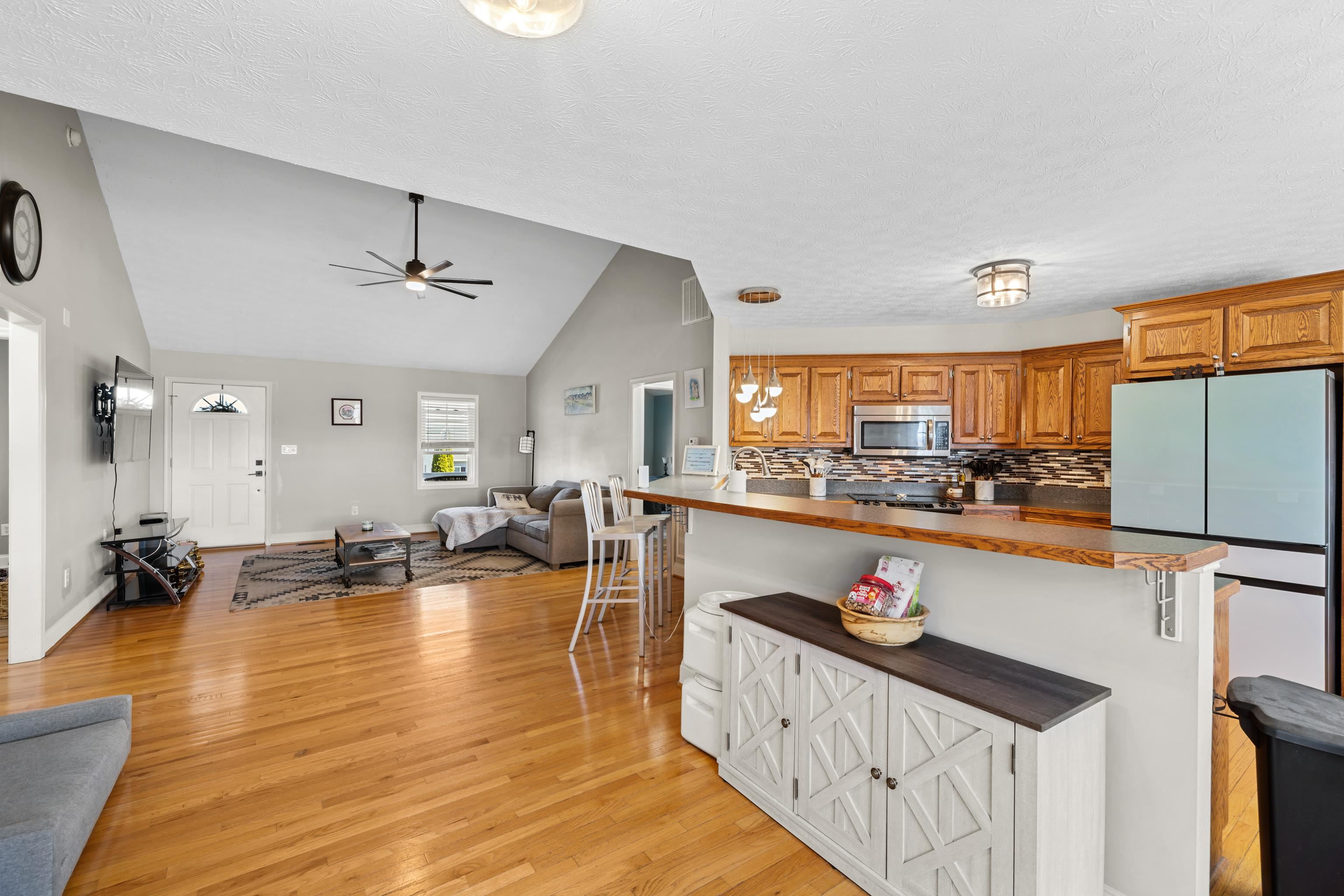 105 Stone Drive Stuarts Draft, VA 24477 - Photo 13 of 62 a kitchen with stainless steel appliances granite countertop a refrigerator a stove and a sink with cabinets