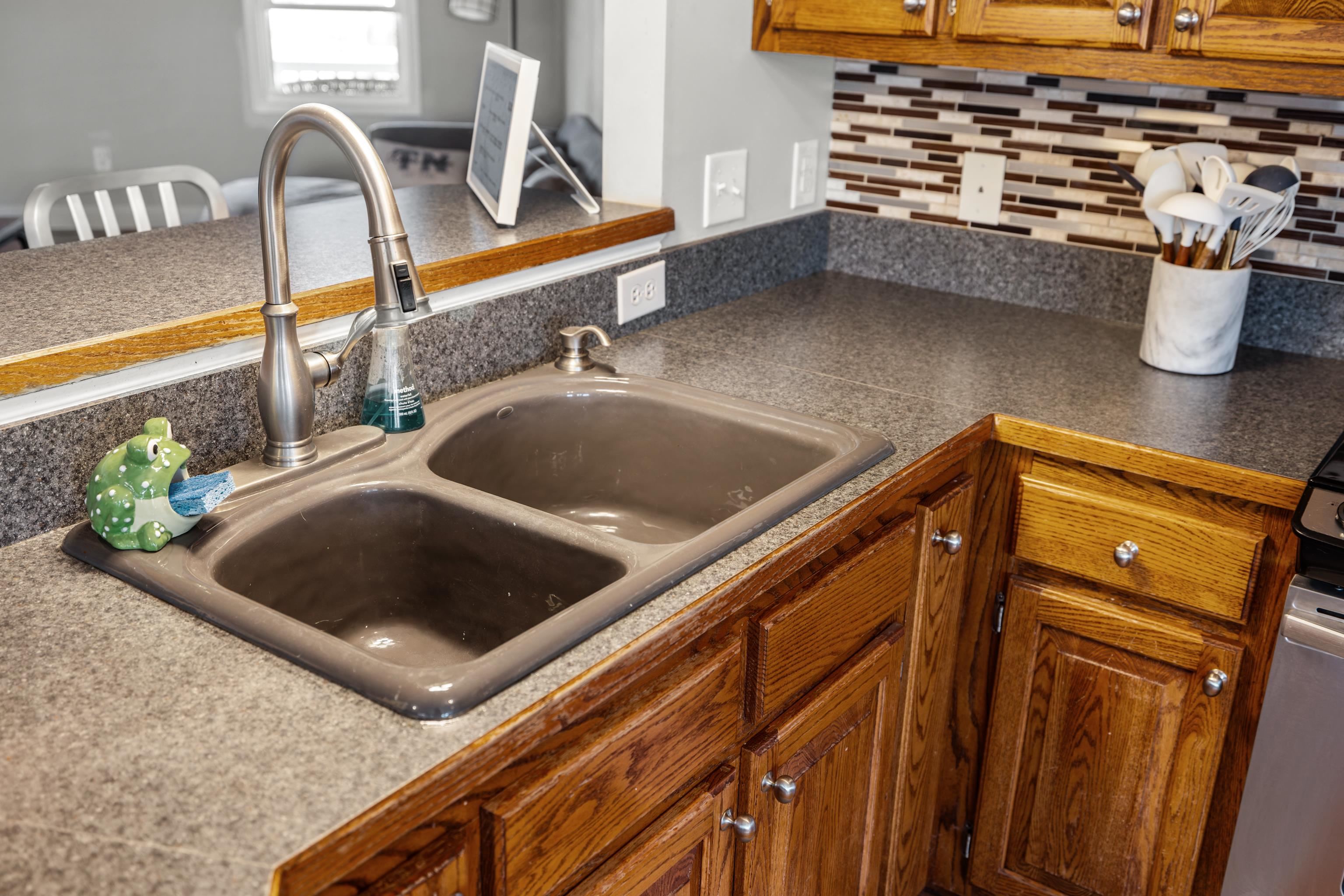105 Stone Drive Stuarts Draft, VA 24477 - Photo 16 of 62 a kitchen with a sink and a microwave