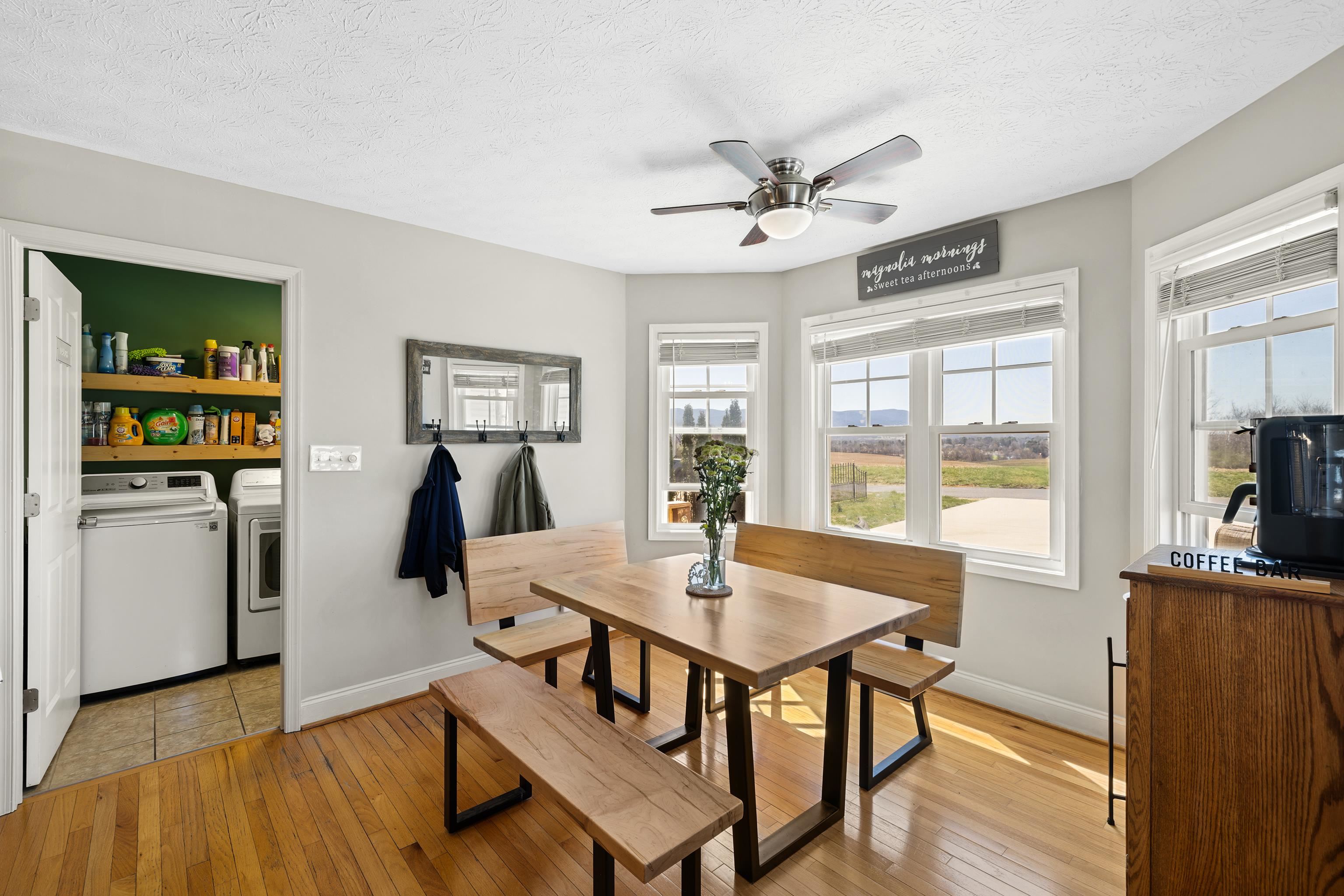 105 Stone Drive Stuarts Draft, VA 24477 - Photo 24 of 62 a view of a dining room with furniture window and wooden floor