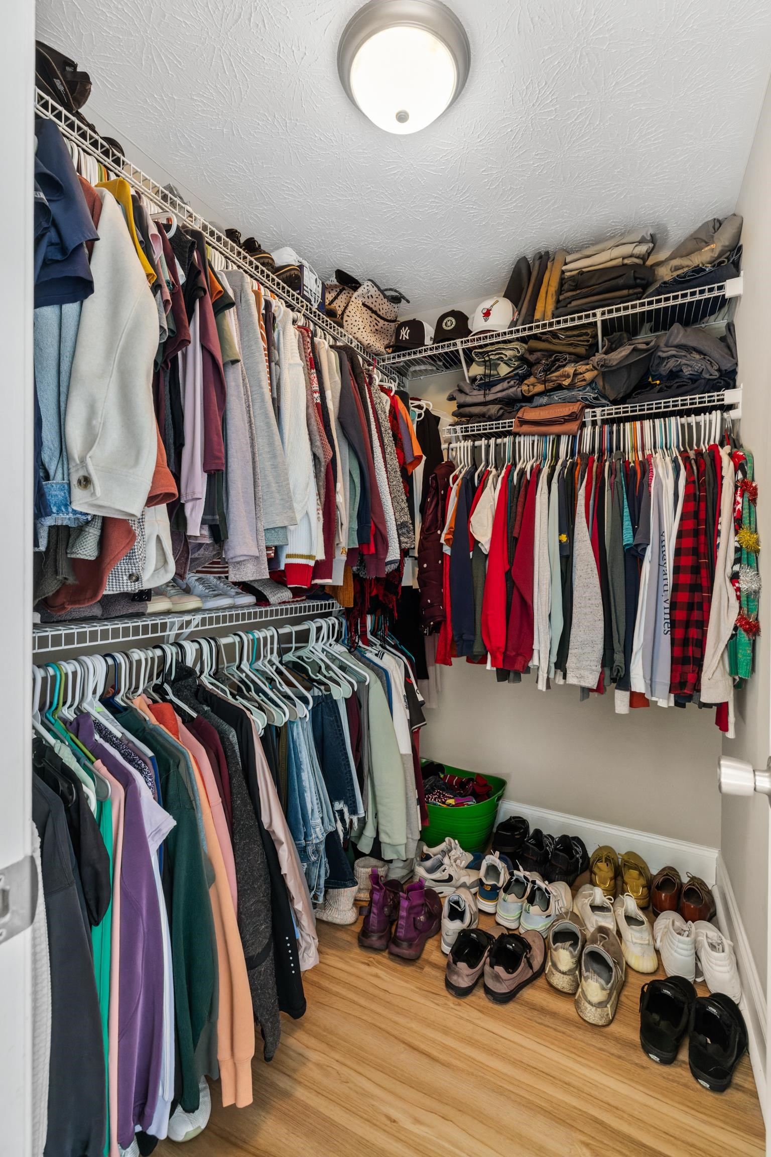105 Stone Drive Stuarts Draft, VA 24477 - Photo 36 of 62 a view of walk in closet with clothes and shoes