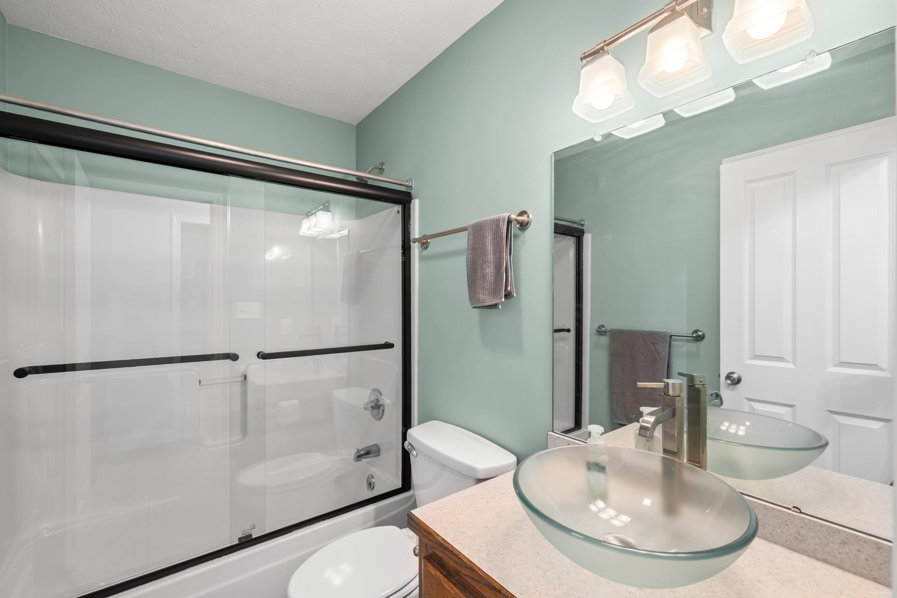 105 Stone Drive Stuarts Draft, VA 24477 - Photo 39 of 62 a bathroom with a sink toilet and shower