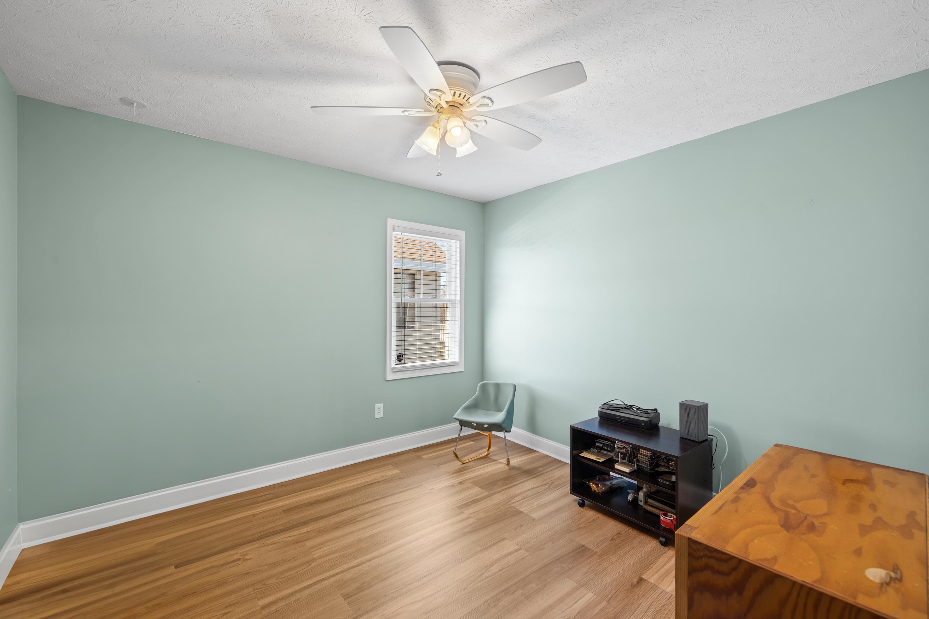 105 Stone Drive Stuarts Draft, VA 24477 - Photo 42 of 62 a living room with furniture and a window