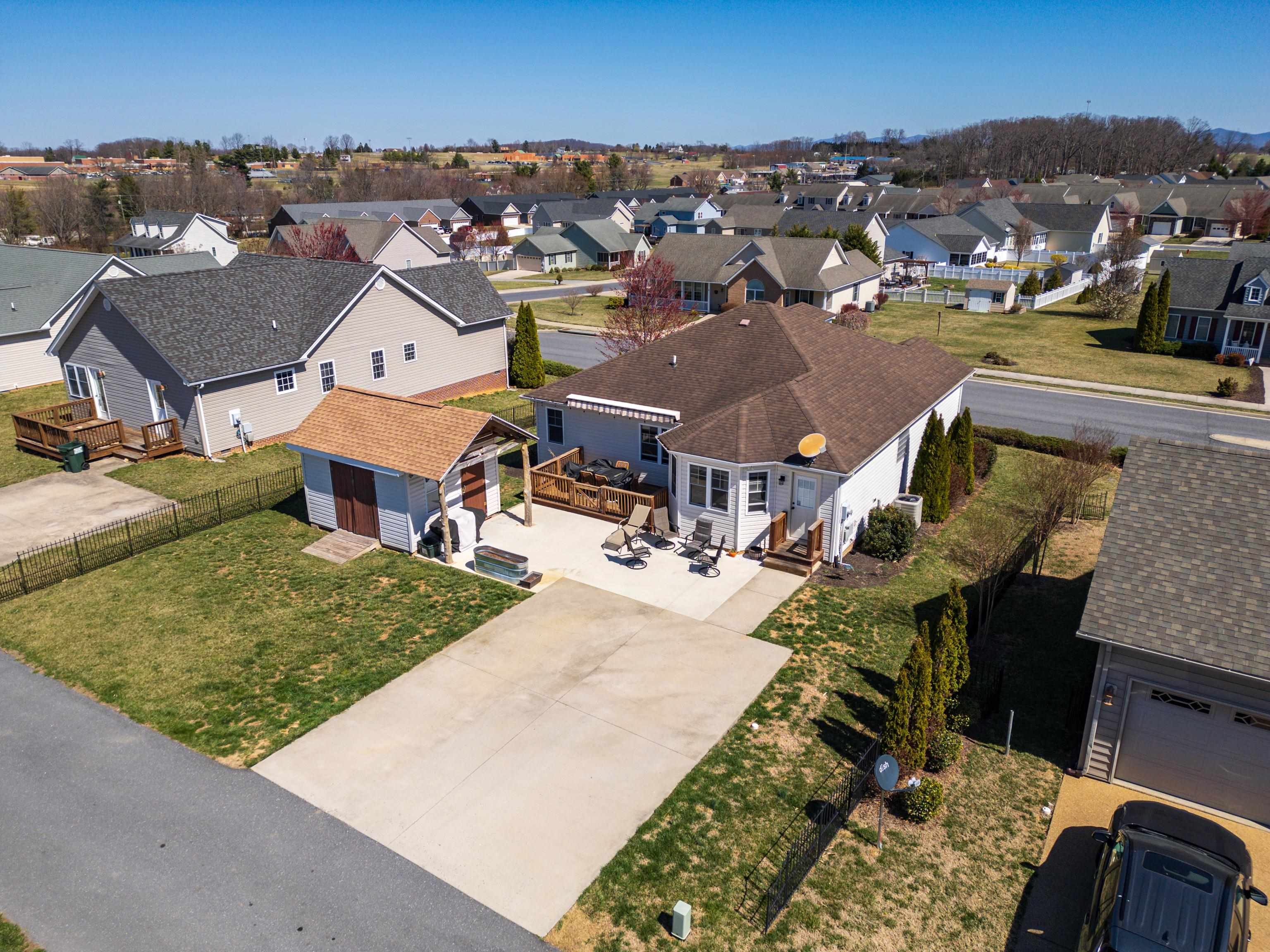 105 Stone Drive Stuarts Draft, VA 24477 - Photo 54 of 62 an aerial view of a house with swimming pool and mountains
