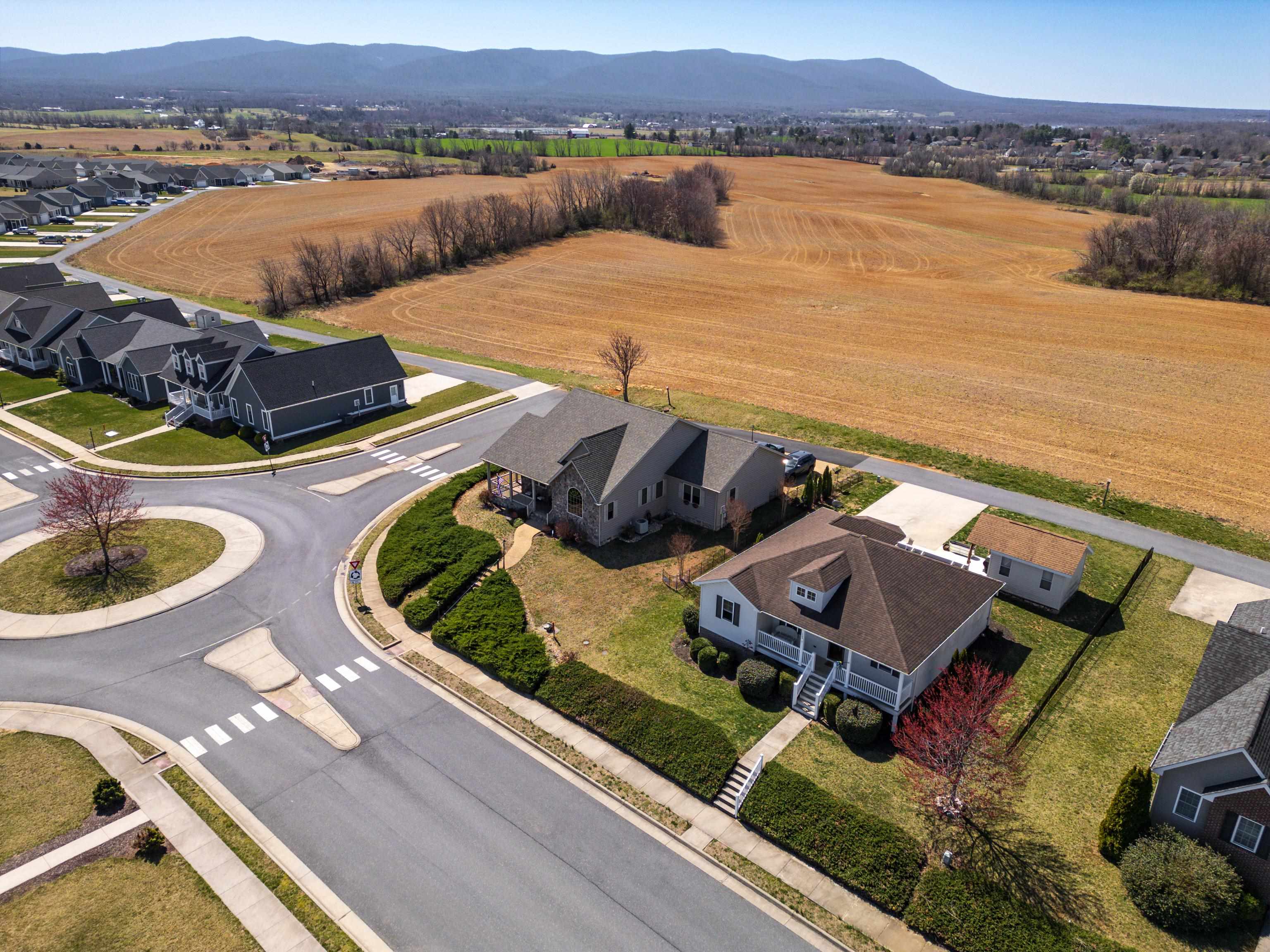 105 Stone Drive Stuarts Draft, VA 24477 - Photo 60 of 62 an aerial view of a house with garden space and outdoor seating