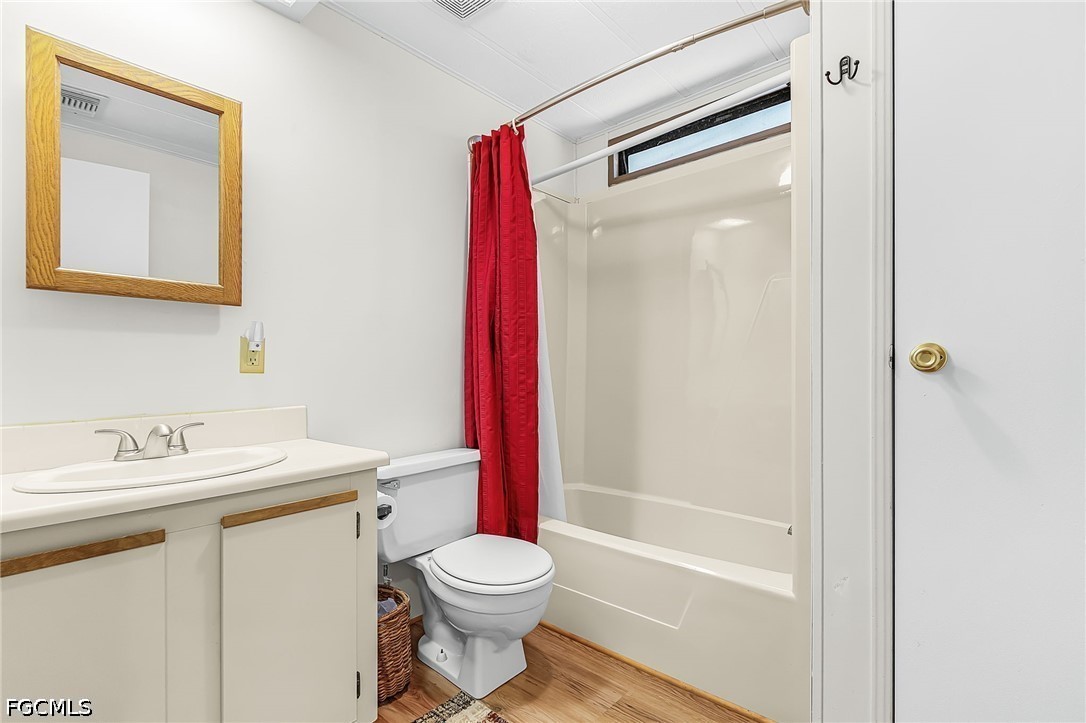 5 Erica Street Alva, FL 33920 - Photo 16 of 37 a bathroom with a sink toilet and shower