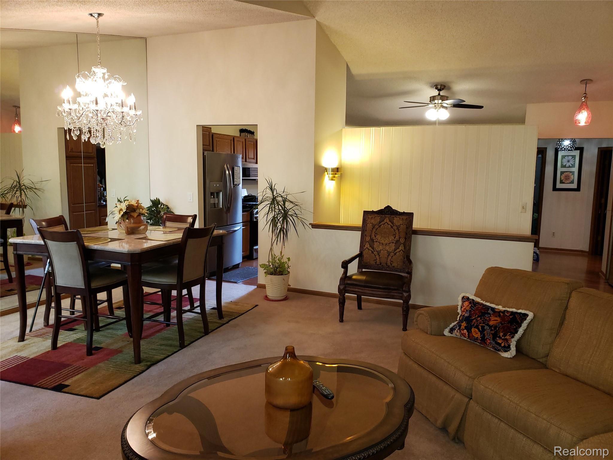 21970 River Ridge Trail, Unit 72 Farmington, MI 48335 - Photo 7 of 38 Great Room, Dining w/Kitchen, Entry Hallway