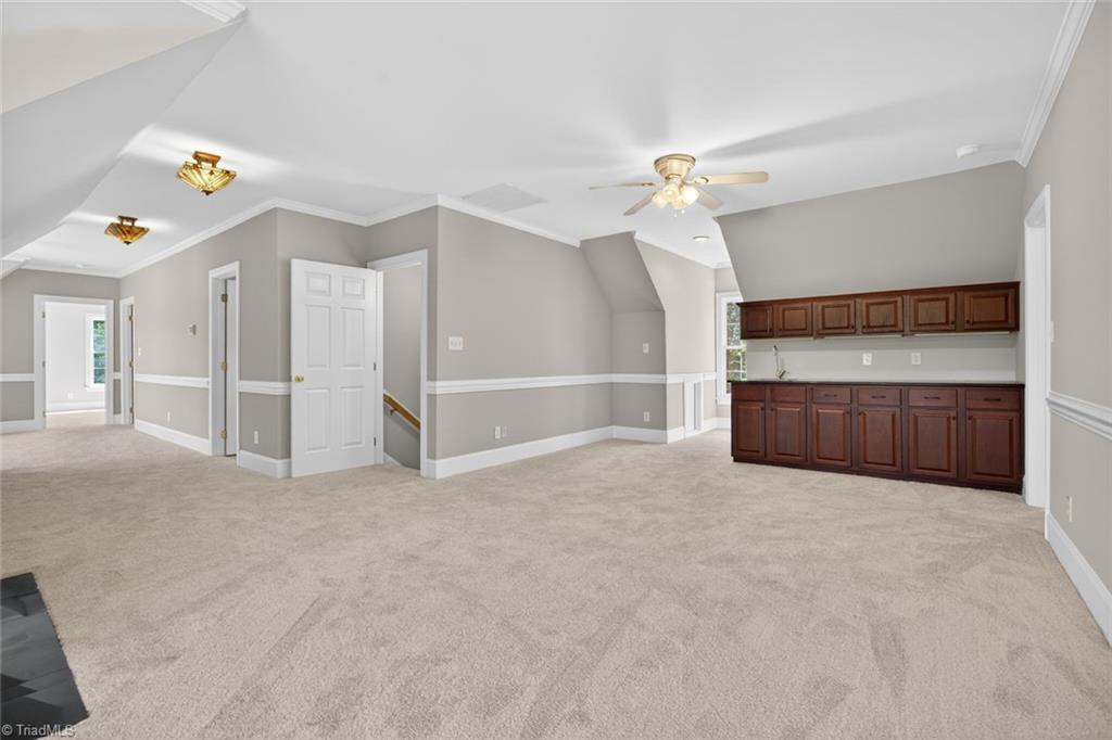 1747 Scalesville Road Summerfield, NC 27358 - Photo 27 of 49 Second floor family room with bar