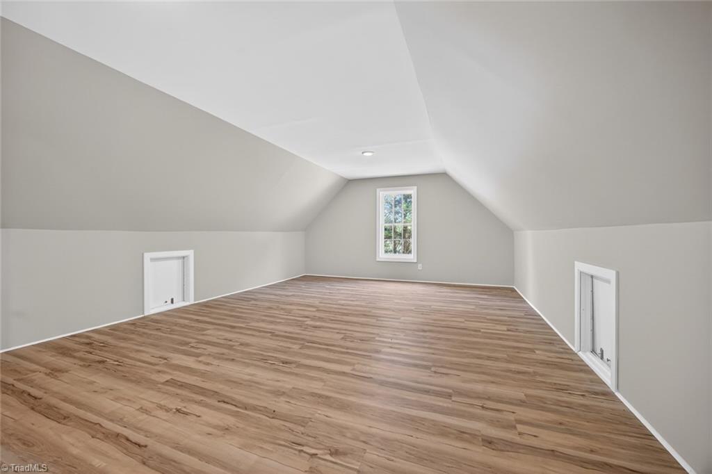 1747 Scalesville Road Summerfield, NC 27358 - Photo 34 of 49 Storage non-heated or cooled (above the garage)