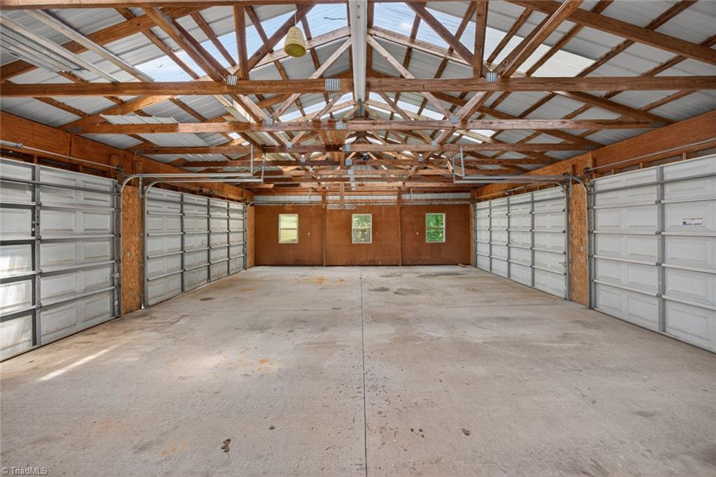 1747 Scalesville Road Summerfield, NC 27358 - Photo 44 of 49 Multi-purpose double sided garage doors