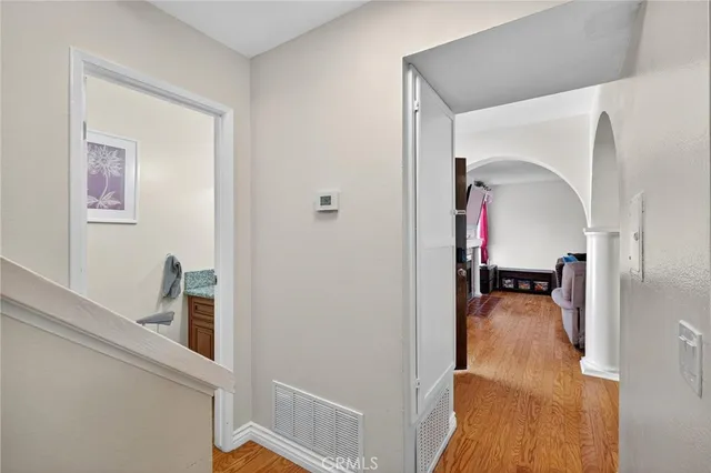 a view of a hallway with workspace