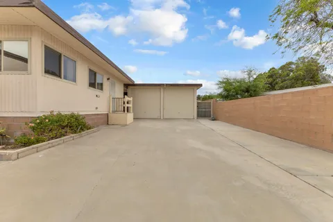 a view of residential houses with outdoor space