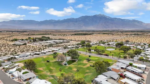 an aerial view of residential house with outdoor space