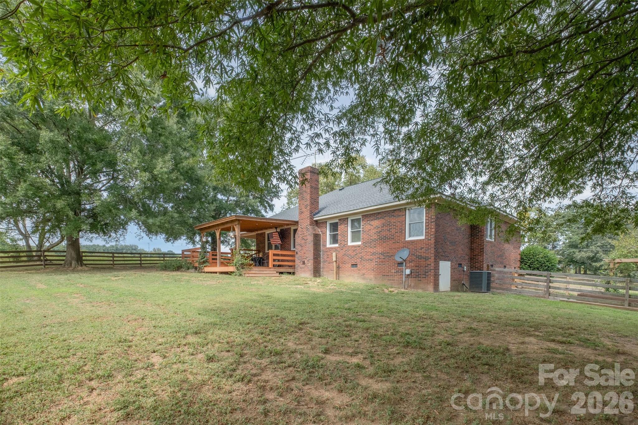 2212 Biggers Cemetery Road Monroe, NC 28110 - Photo 12 of 30 a view of a house with a yard