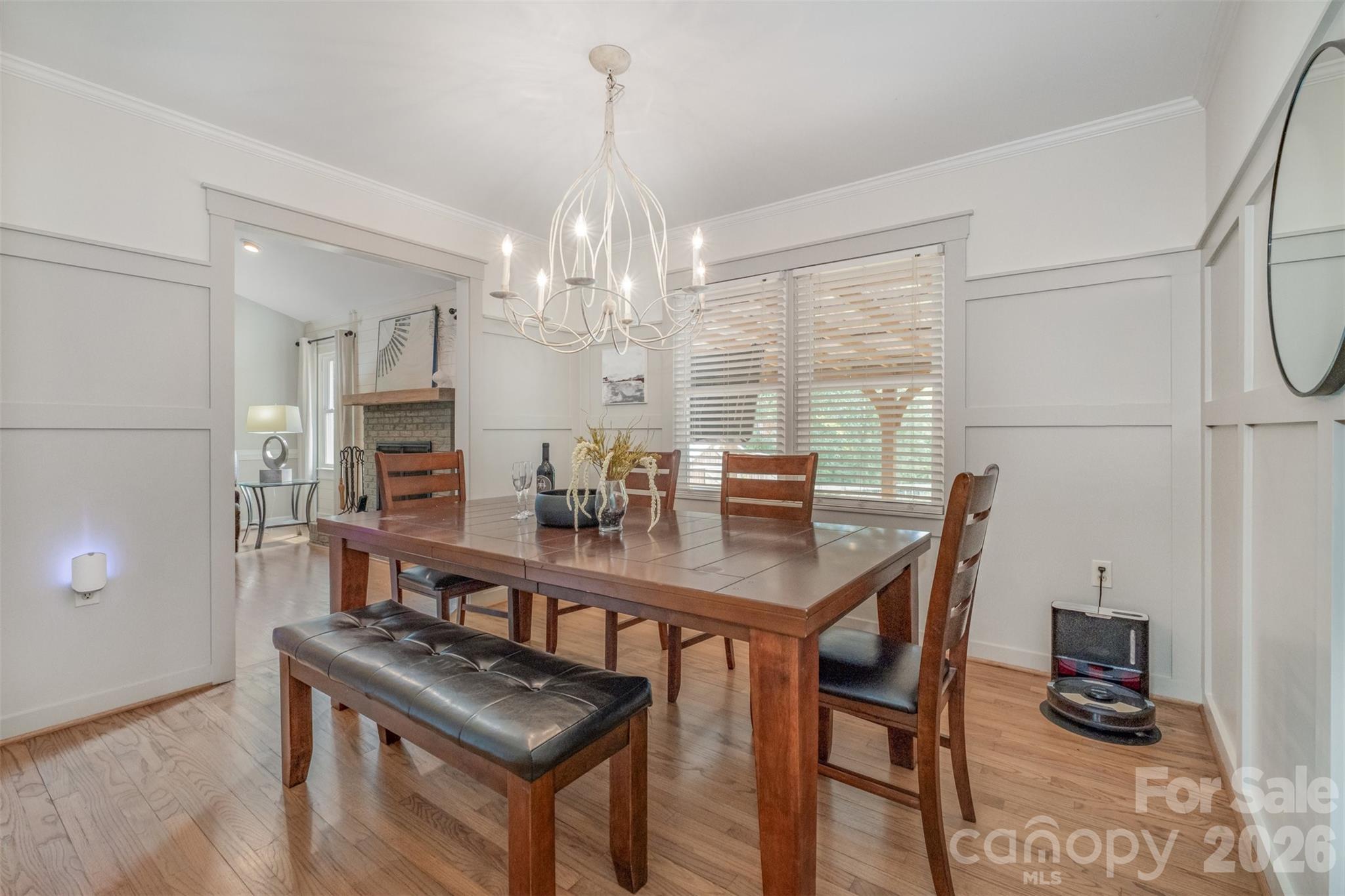 2212 Biggers Cemetery Road Monroe, NC 28110 - Photo 25 of 30 a room with stainless steel appliances a table chairs and utility room