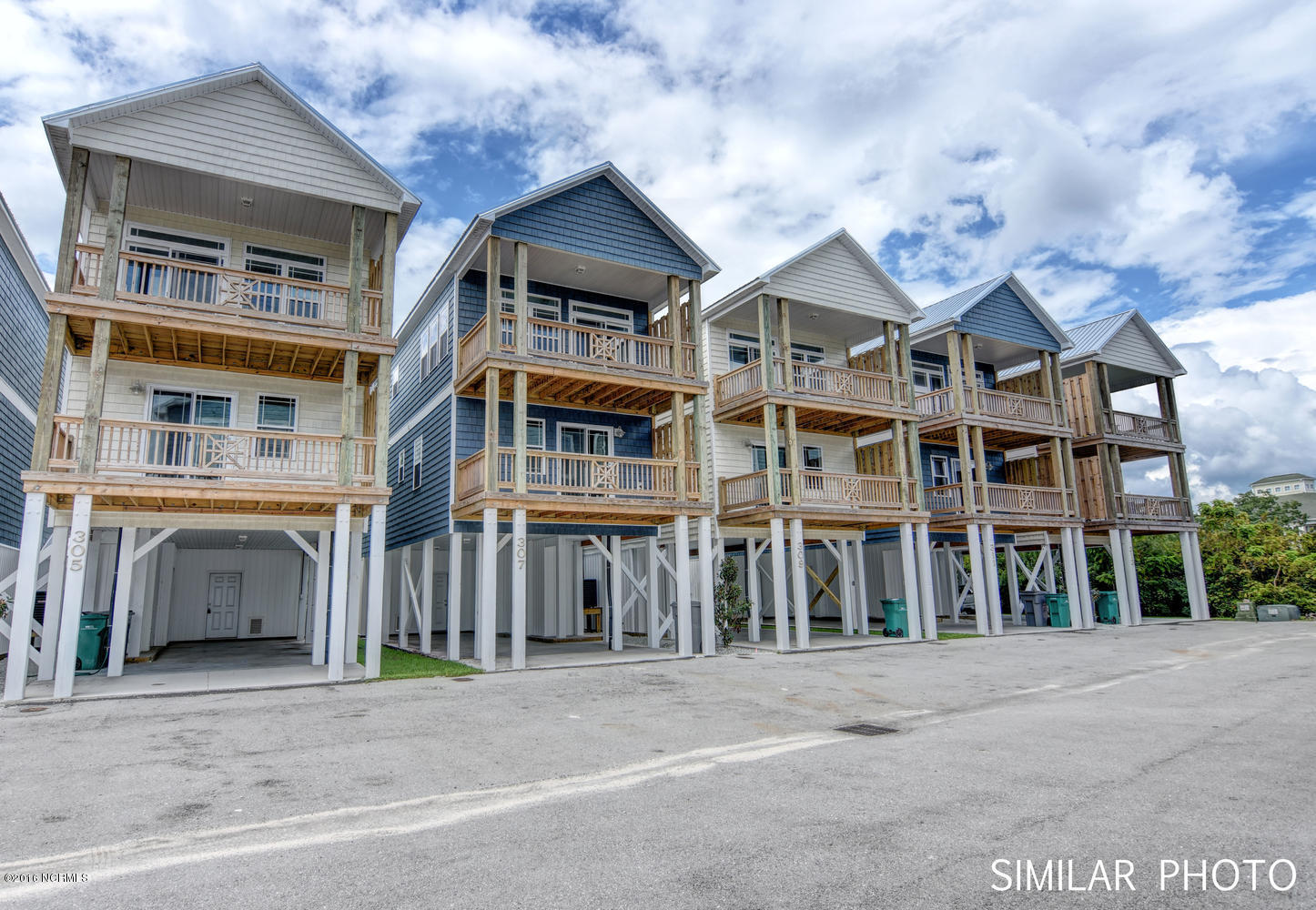 201 Dolphin & Shell Road, Unit C Surf City, NC 28445 - Photo 1 of 24 309 Vista Court Surf City NC-large-001-2