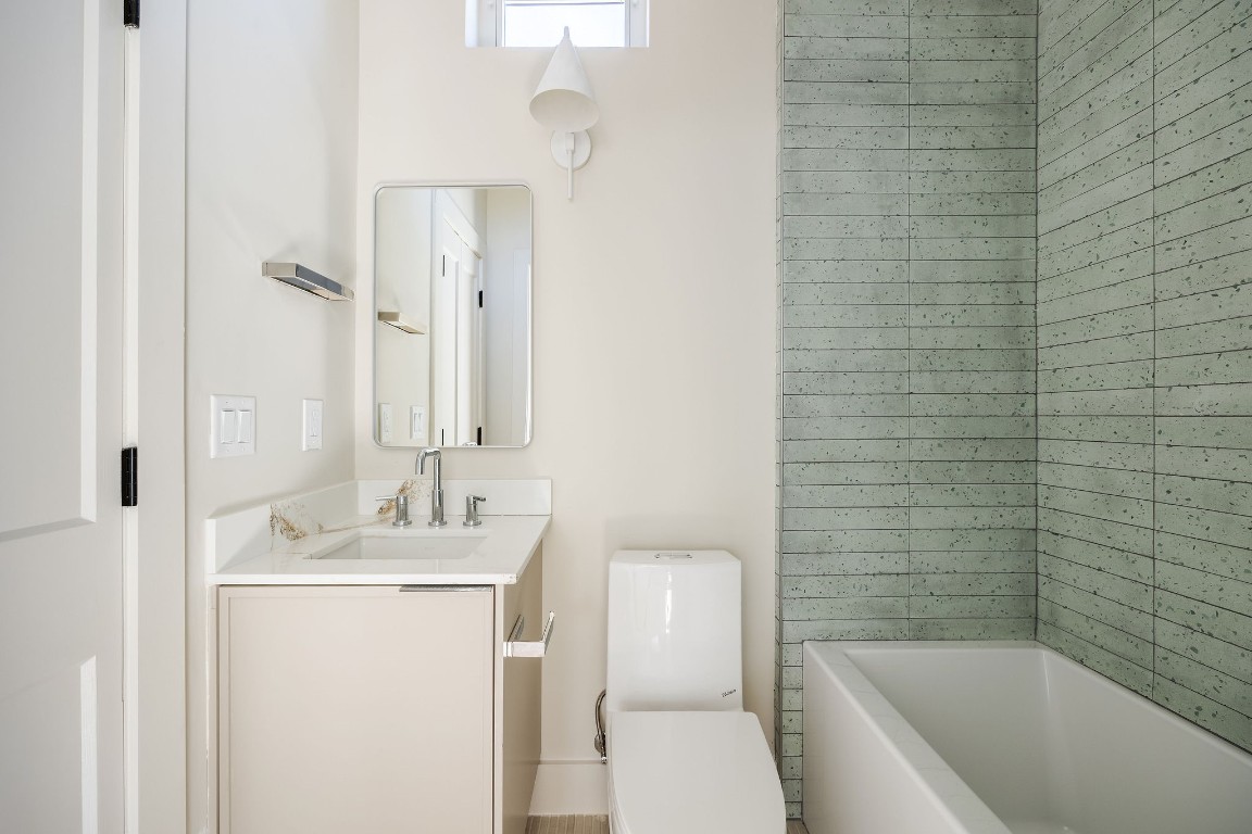 1802 Overhill Drive, Unit A Austin, TX 78721 - Photo 18 of 37 Full bathroom in the the studio space above the garage.