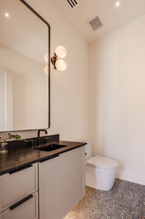 1802 Overhill Drive, Unit A Austin, TX 78721 - Photo 19 of 37 Half bathroom on main floor.