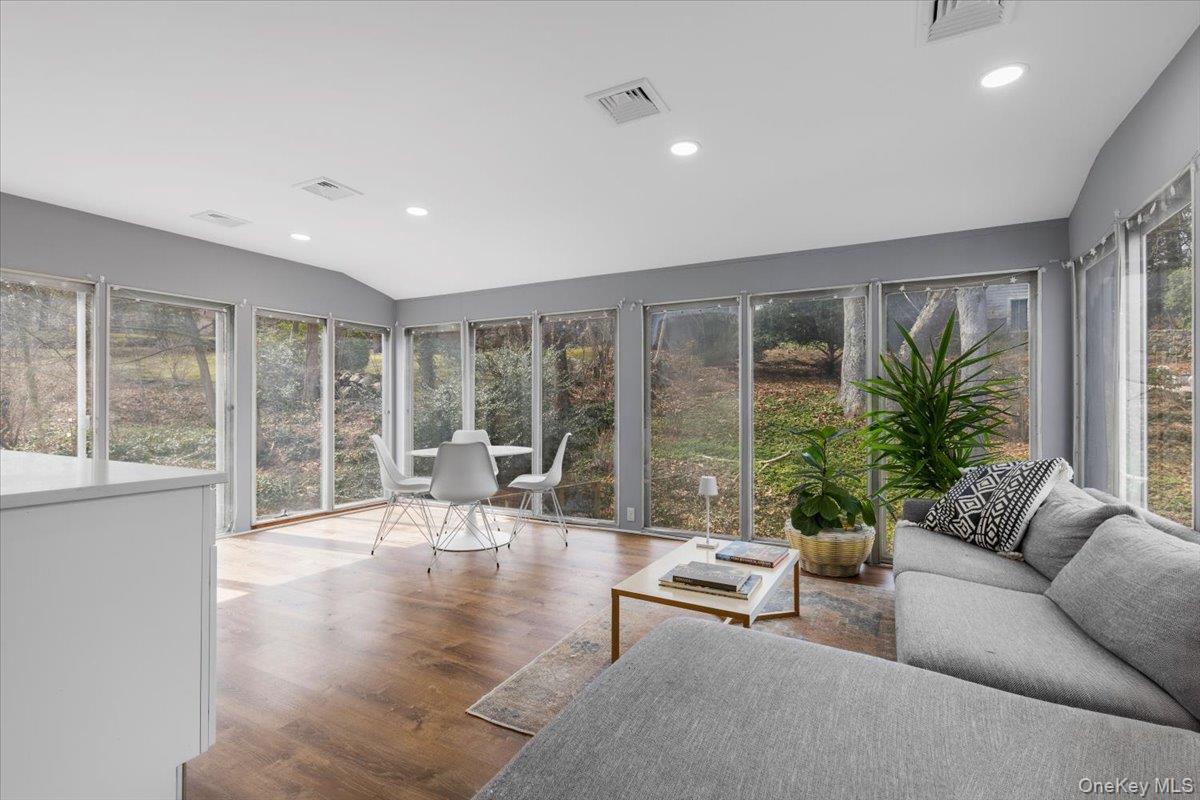 111 Spier Road Scarsdale, NY 10583 - Photo 12 of 37 a living room with furniture and a large window