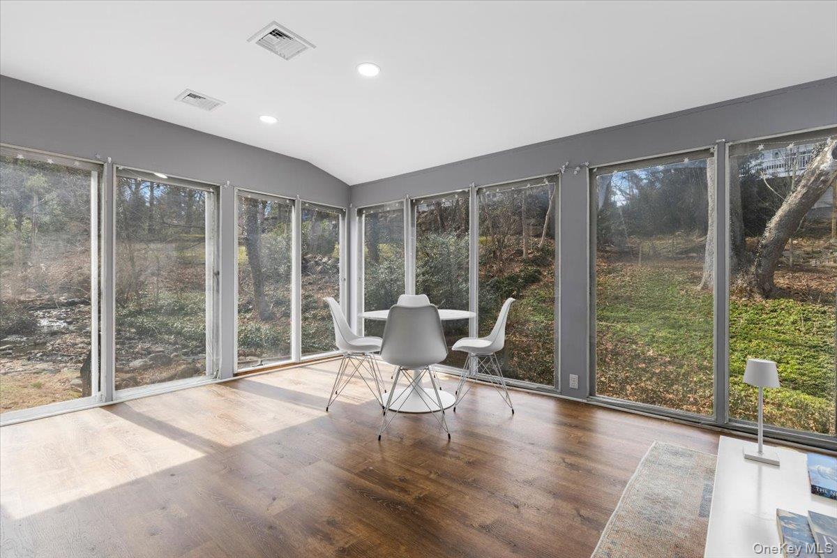 111 Spier Road Scarsdale, NY 10583 - Photo 13 of 37 a living room with hardwood floor and balcony