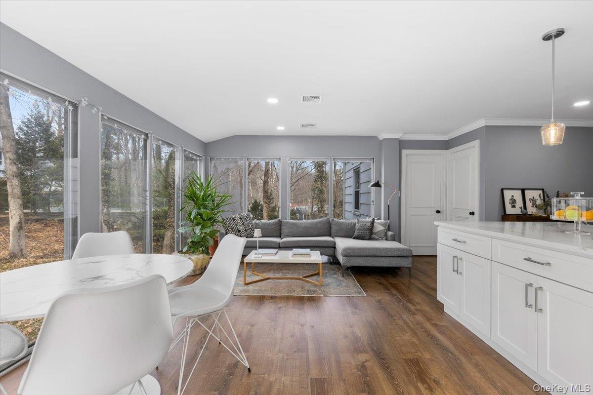 111 Spier Road Scarsdale, NY 10583 - Photo 14 of 37 a living room with furniture and a large window