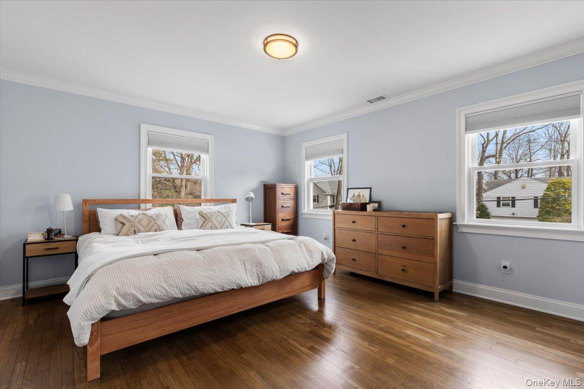 111 Spier Road Scarsdale, NY 10583 - Photo 20 of 37 a bedroom with a bed and a window