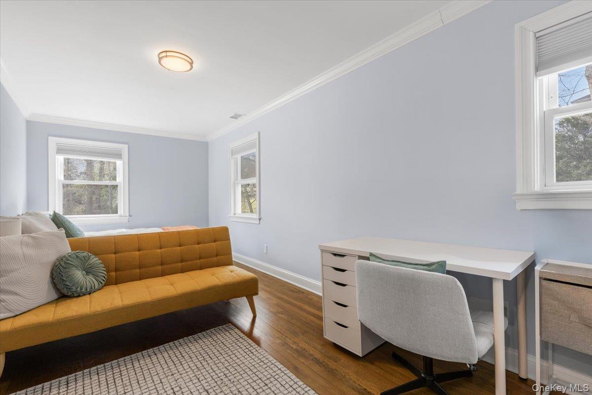 111 Spier Road Scarsdale, NY 10583 - Photo 24 of 37 a living room with furniture and a window