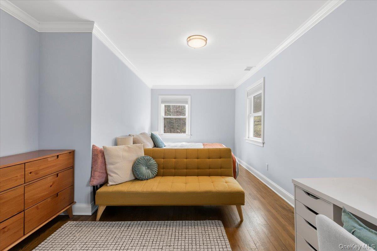 111 Spier Road Scarsdale, NY 10583 - Photo 25 of 37 a living room with furniture and a window