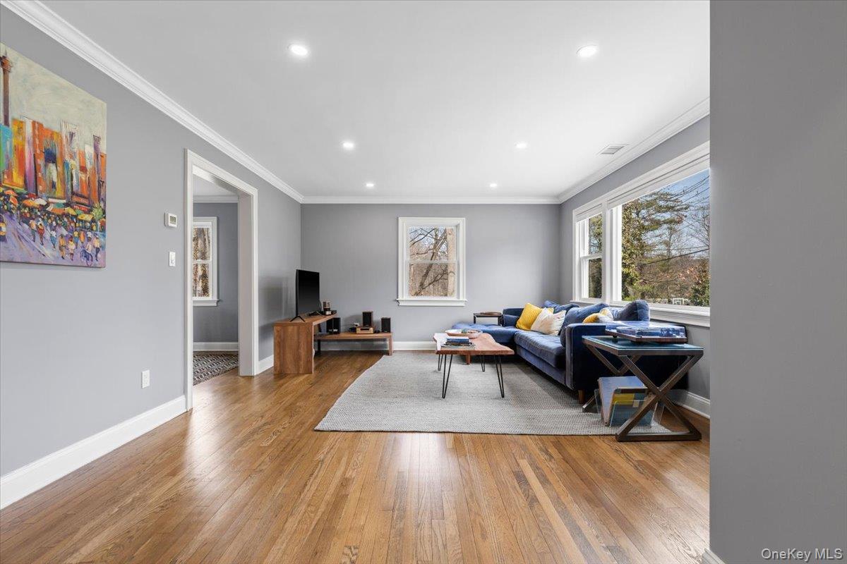 111 Spier Road Scarsdale, NY 10583 - Photo 7 of 37 a living room with furniture and wooden floor