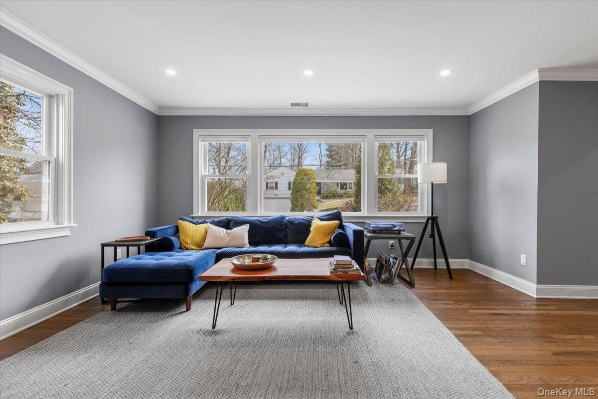 111 Spier Road Scarsdale, NY 10583 - Photo 9 of 37 a living room with furniture and a window