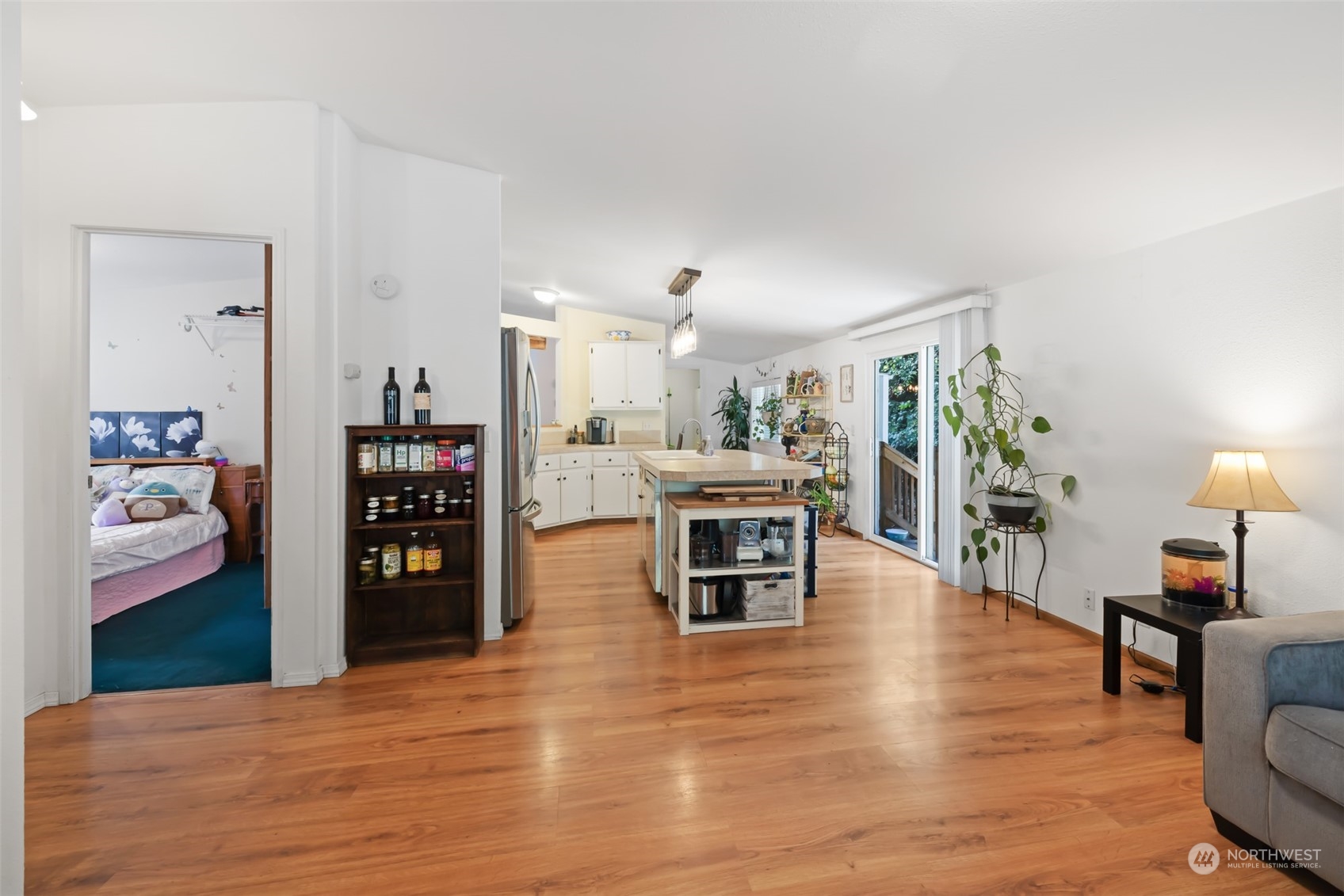 4982 Happy Valley Road Sequim, WA 98382 - Photo 12 of 40 a living room with furniture and a wooden floor