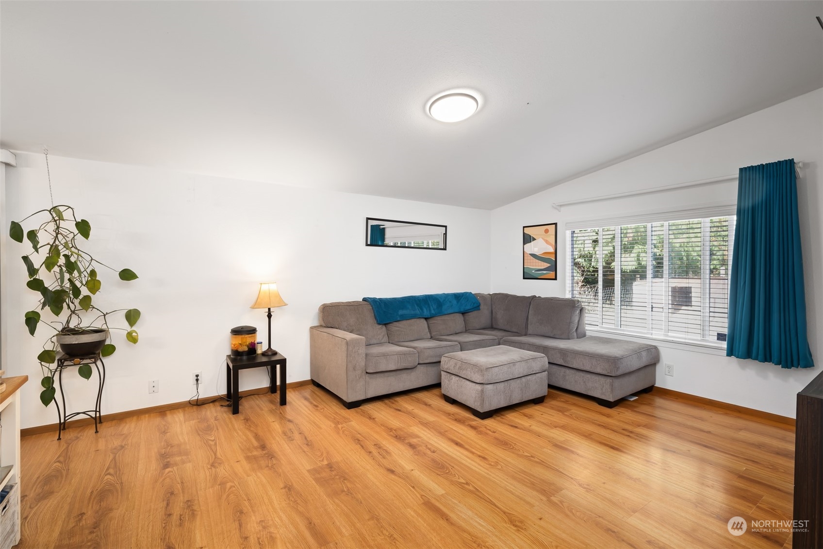 4982 Happy Valley Road Sequim, WA 98382 - Photo 13 of 40 a living room with furniture and a large window