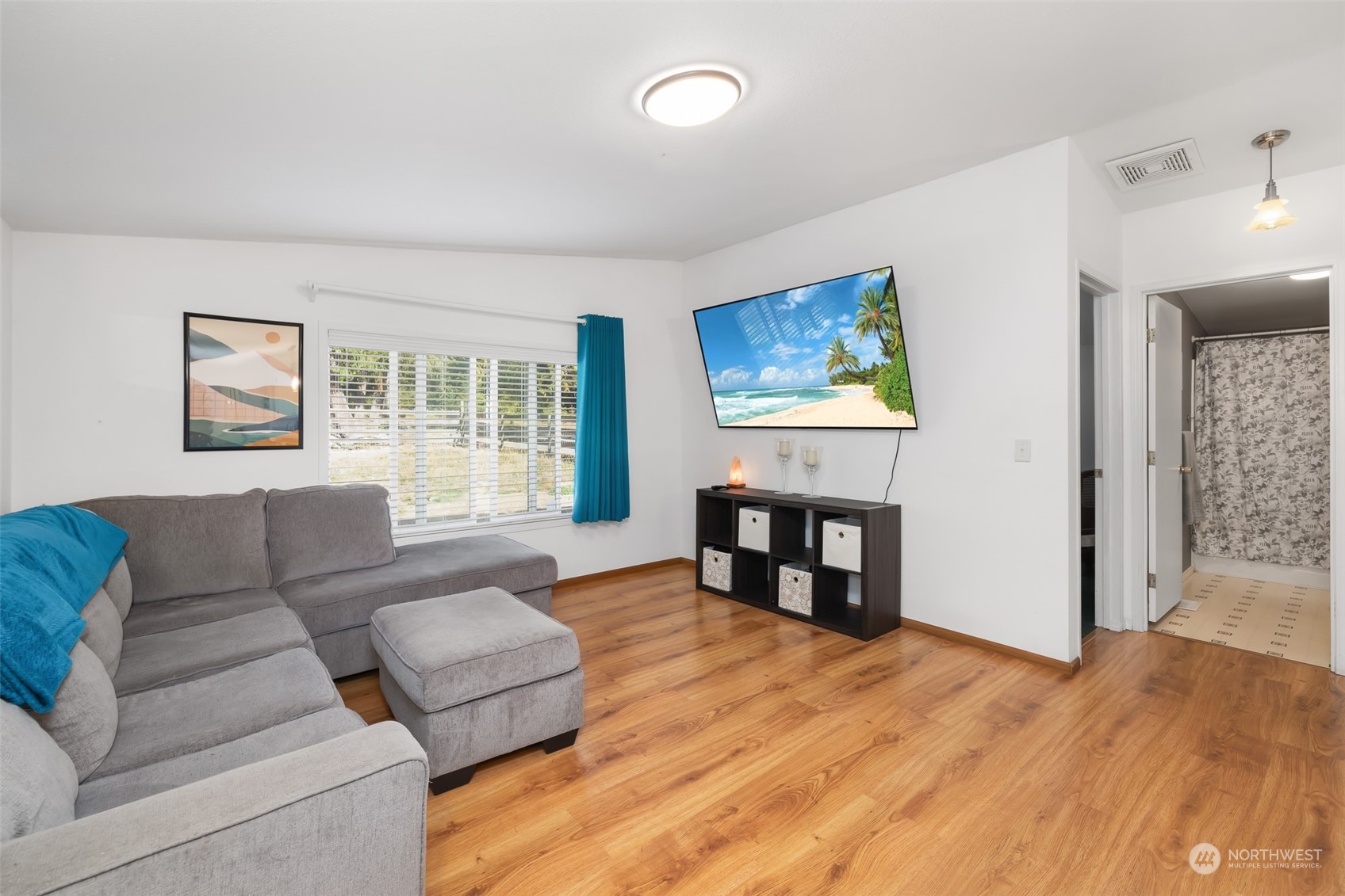4982 Happy Valley Road Sequim, WA 98382 - Photo 14 of 40 a living room with furniture and a wooden floor