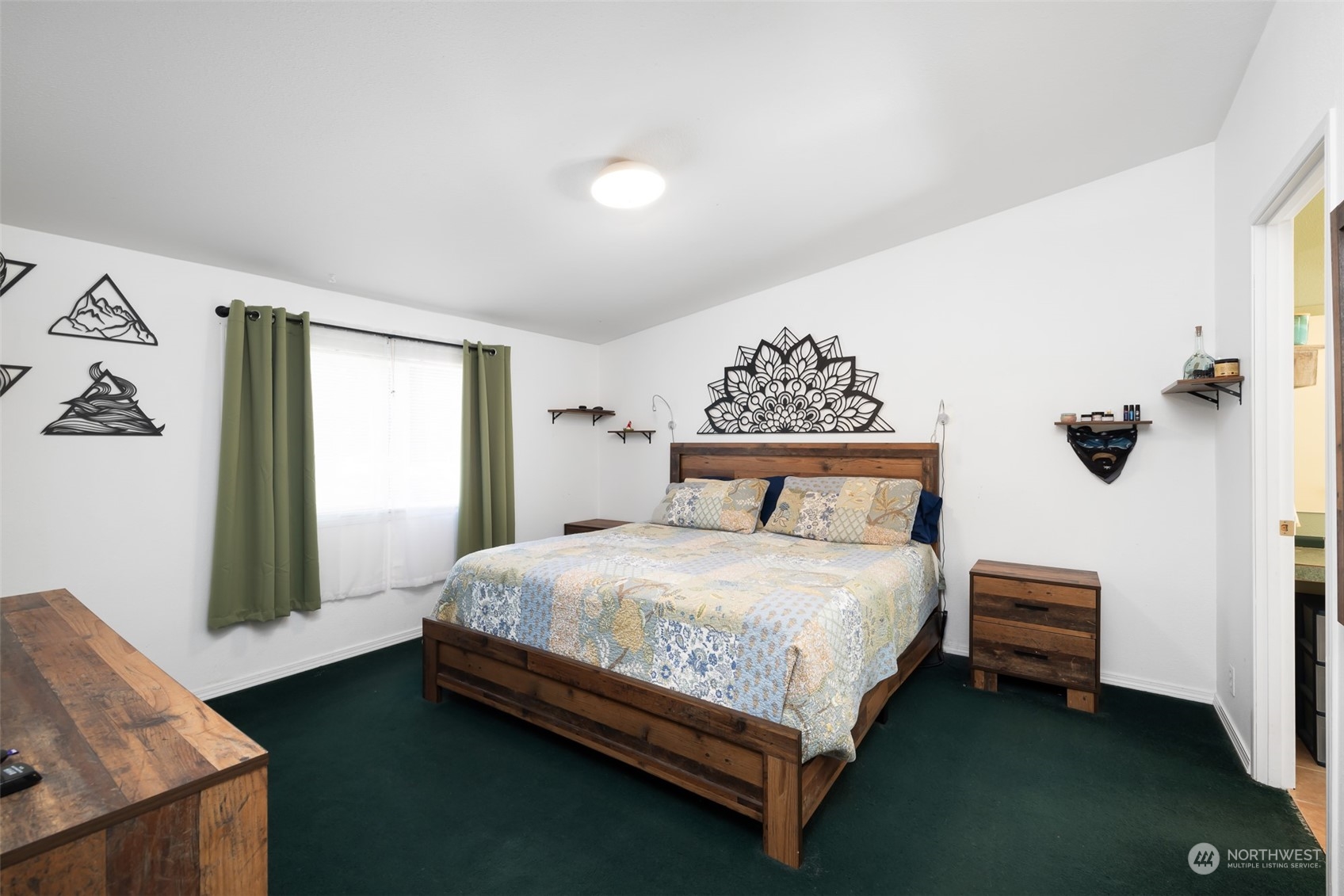 4982 Happy Valley Road Sequim, WA 98382 - Photo 15 of 40 a bedroom with a bed and a window