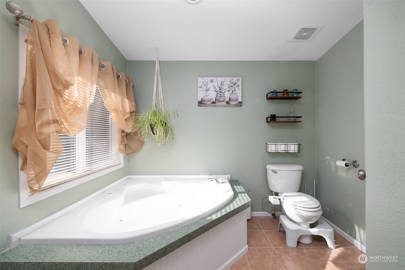 4982 Happy Valley Road Sequim, WA 98382 - Photo 18 of 40 a bathroom with a granite countertop sink and a toilet