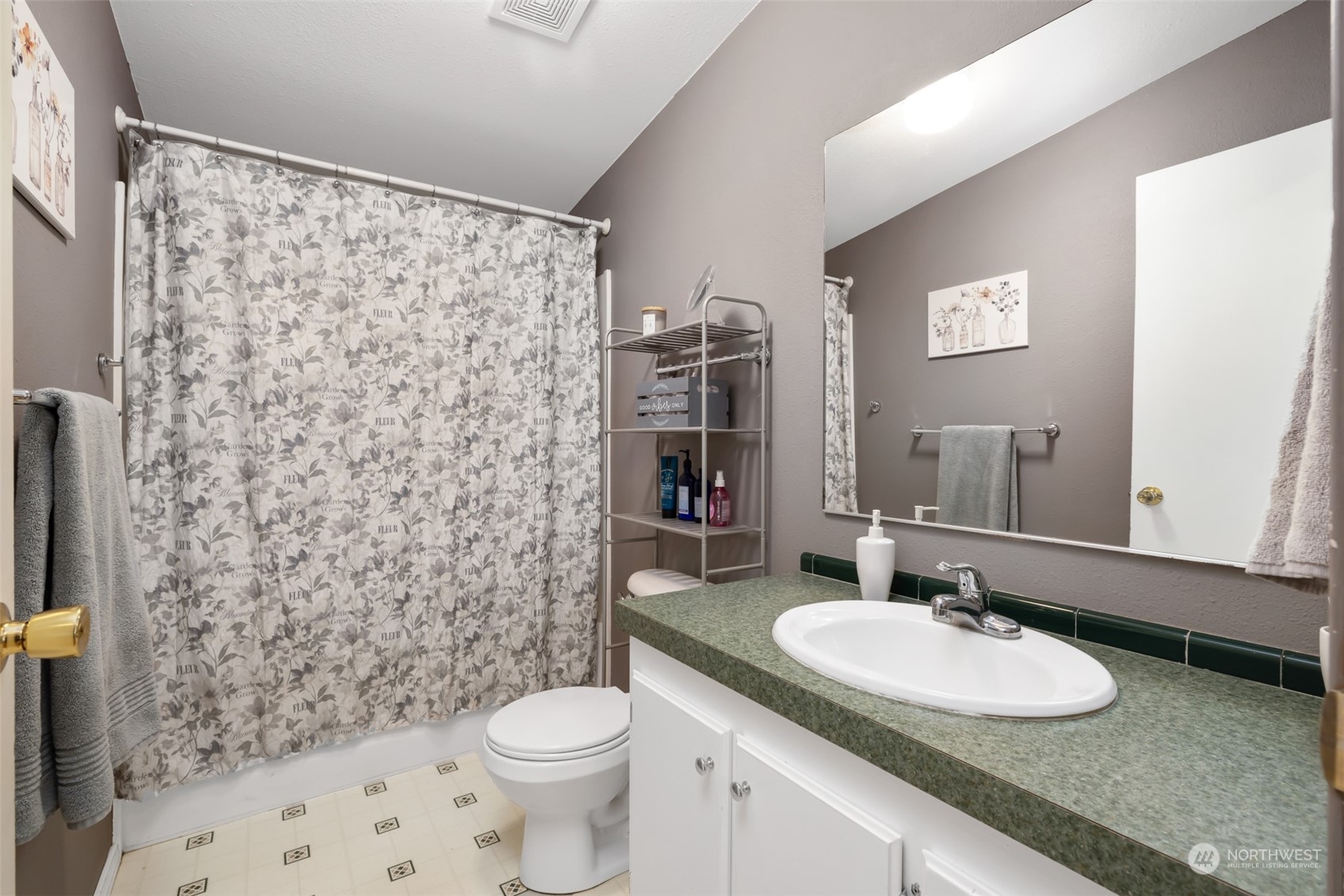 4982 Happy Valley Road Sequim, WA 98382 - Photo 22 of 40 a bathroom with a sink toilet and shower