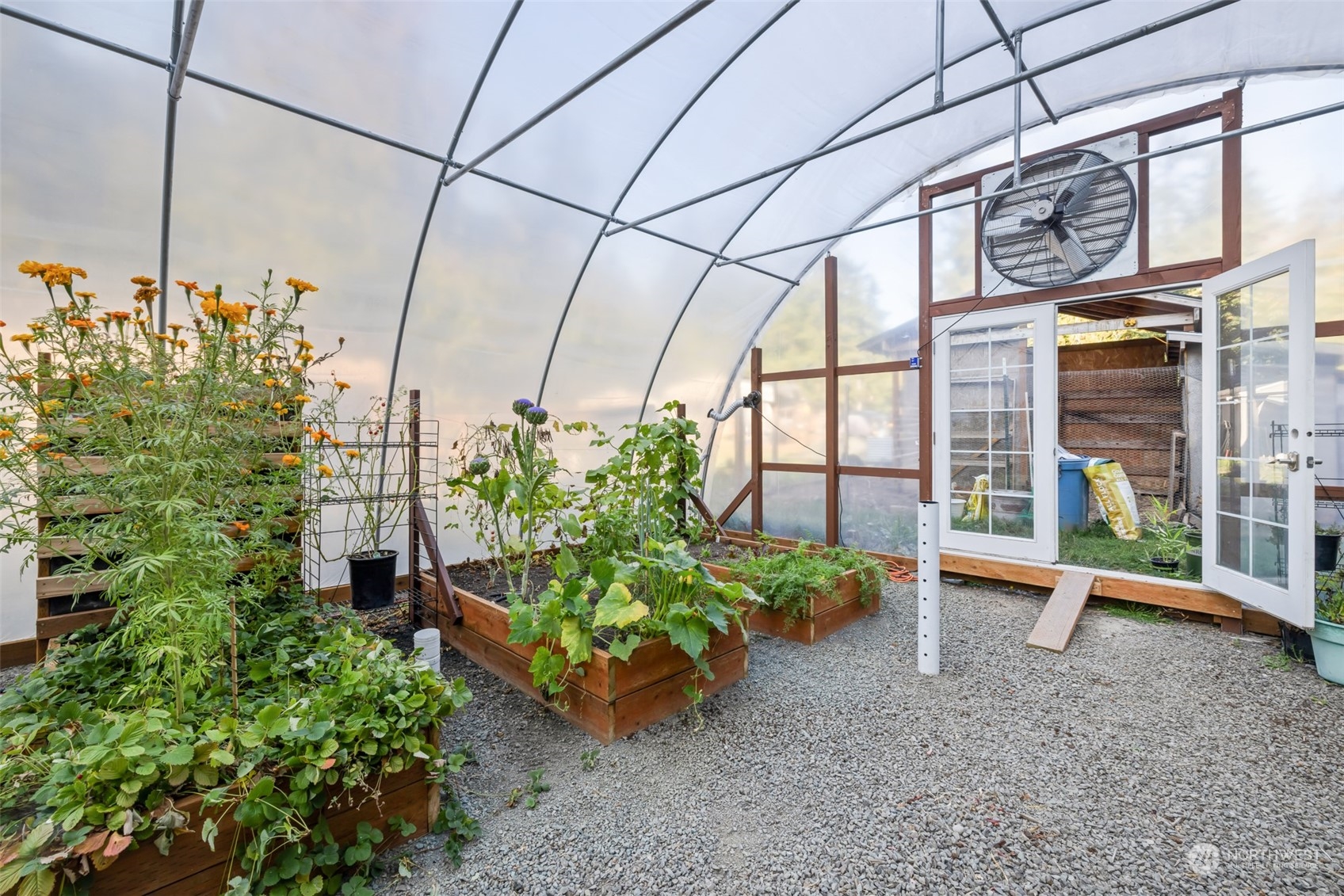 4982 Happy Valley Road Sequim, WA 98382 - Photo 28 of 40 a house view with a garden space