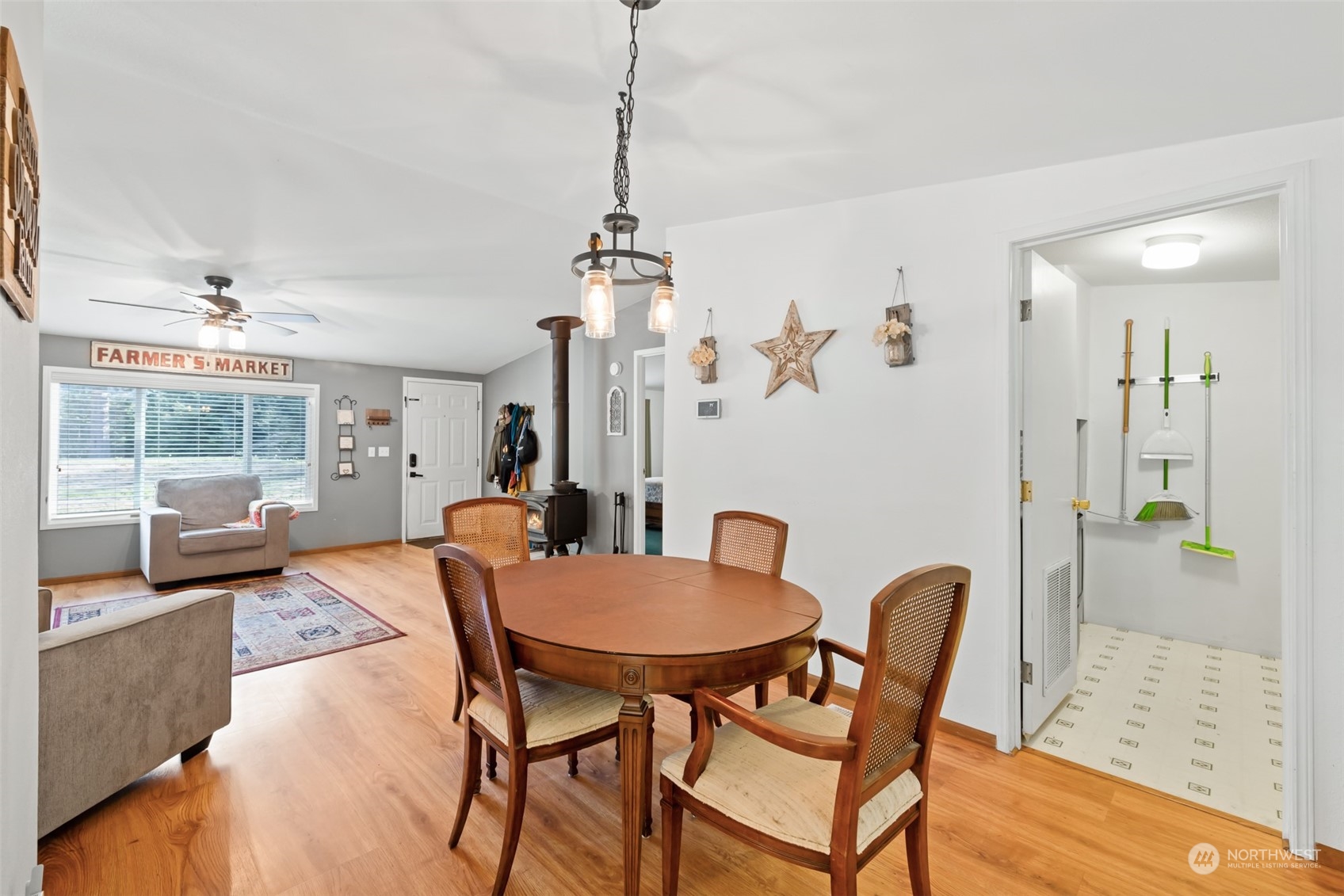 4982 Happy Valley Road Sequim, WA 98382 - Photo 4 of 40 a view of a dining room with furniture and a chandelier