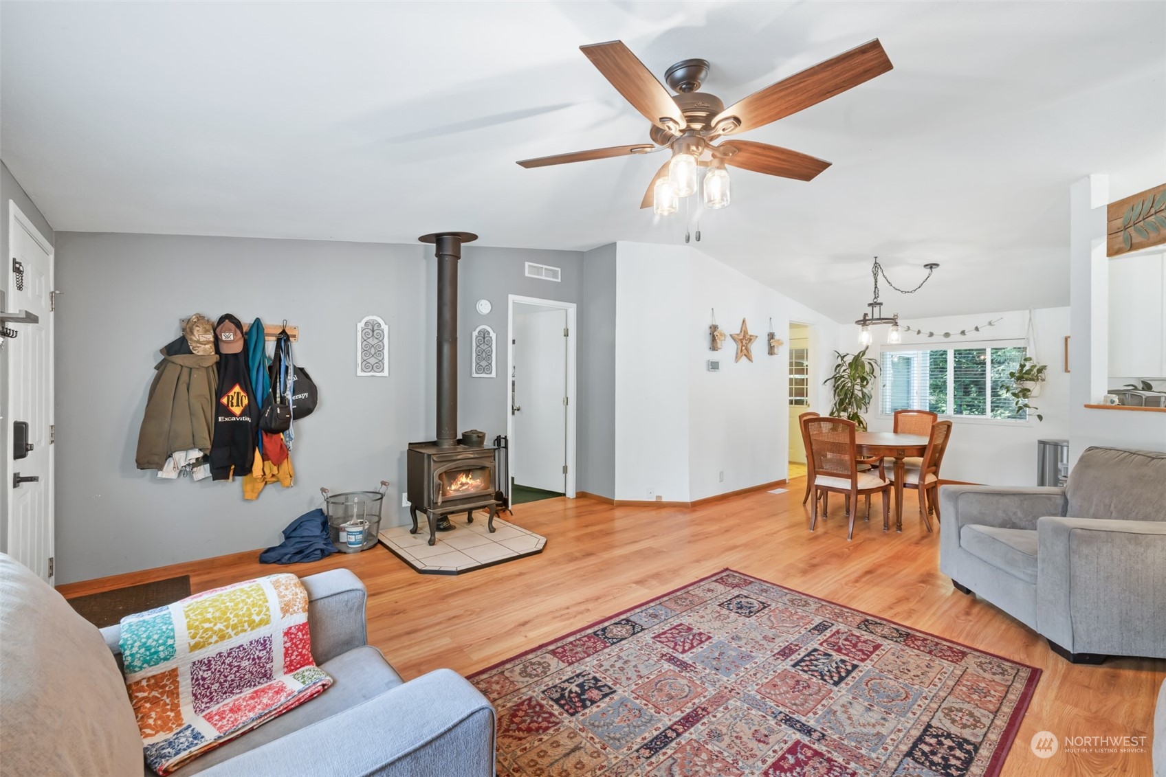 4982 Happy Valley Road Sequim, WA 98382 - Photo 5 of 40 a living room with furniture and a rug