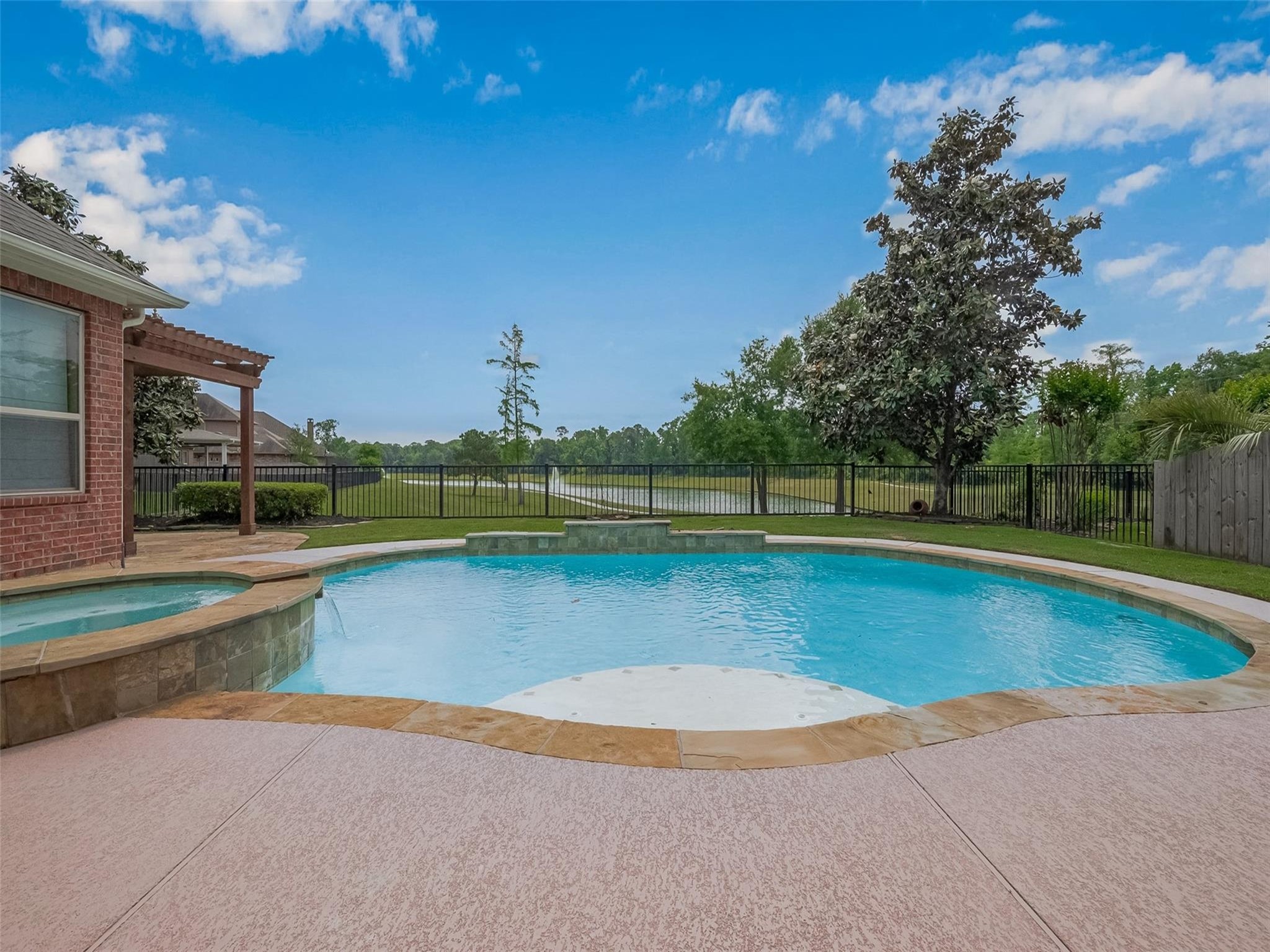 2711 King Point View Lane Spring, TX 77388 - Photo 1 of 48 The setting is serene and perfect for relaxation or entertaining.