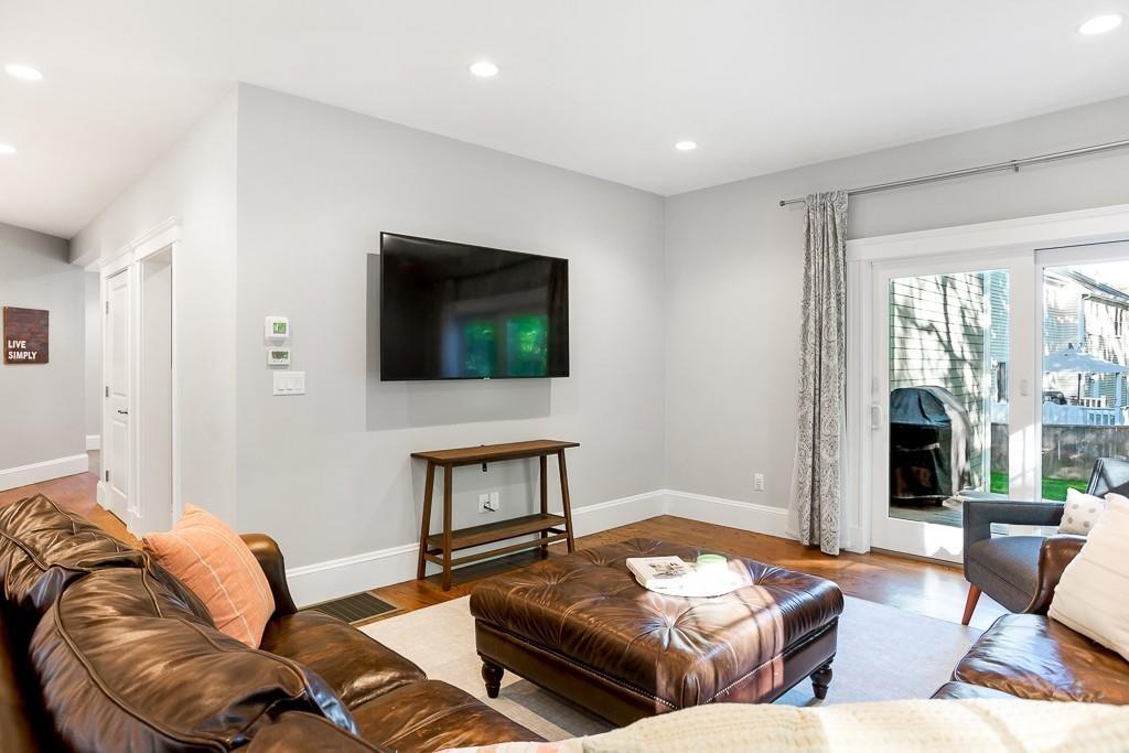 98 Middlesex Street Winchester, MA 01890 - Photo 12 of 35 a living room with furniture and a flat screen tv