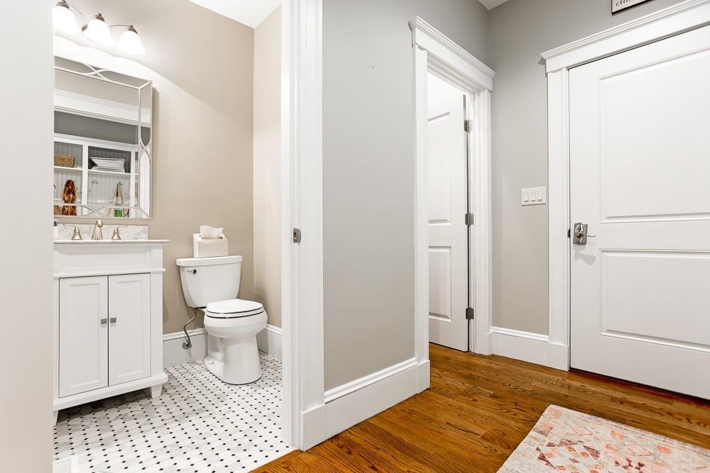 98 Middlesex Street Winchester, MA 01890 - Photo 14 of 35 a bathroom with a sink toilet and a window